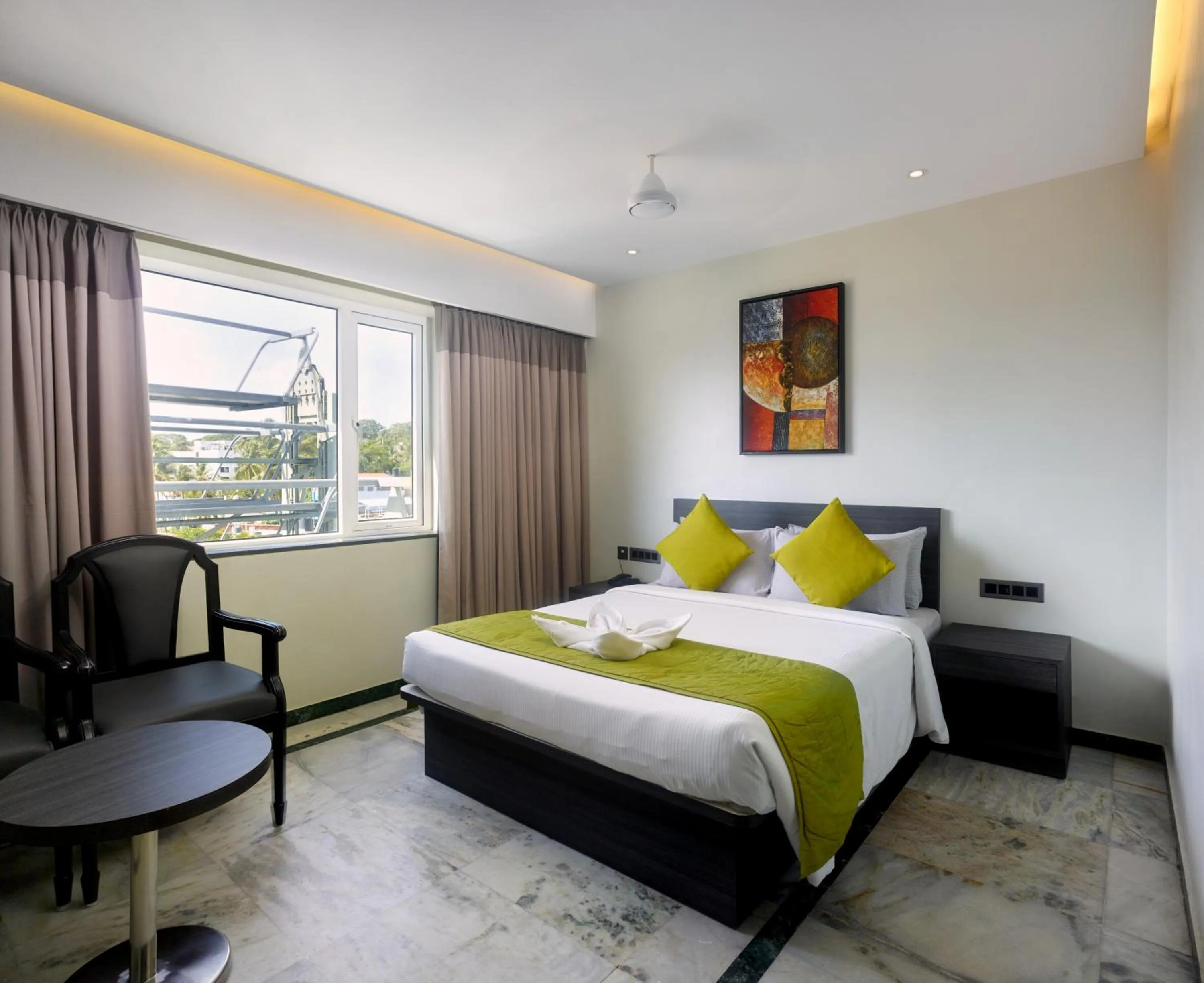 Bed in Ariya Nivaas A Vegetarian Hotel