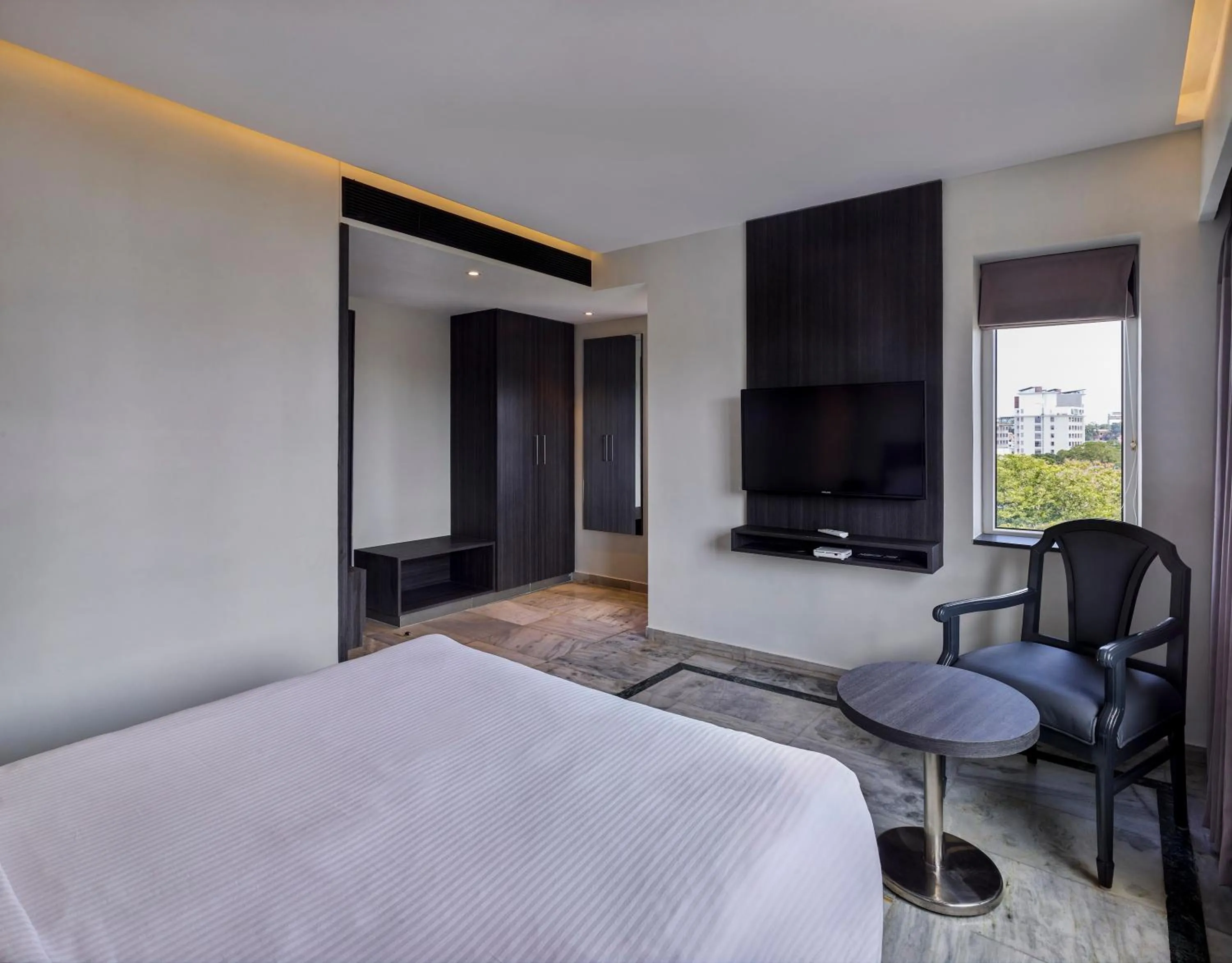 Bed in Ariya Nivaas A Vegetarian Hotel