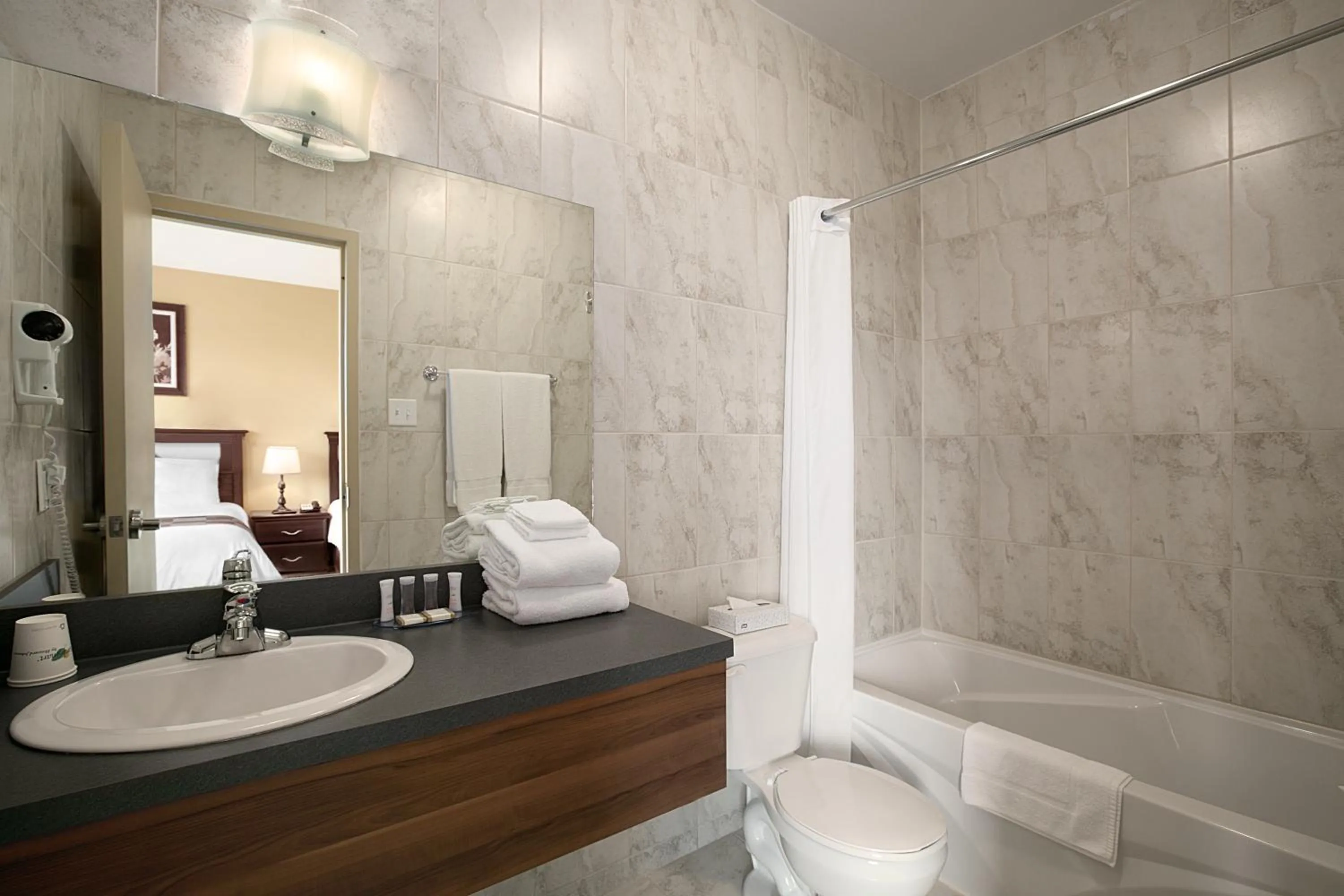 Bathroom in Days Inn by Wyndham Montreal East