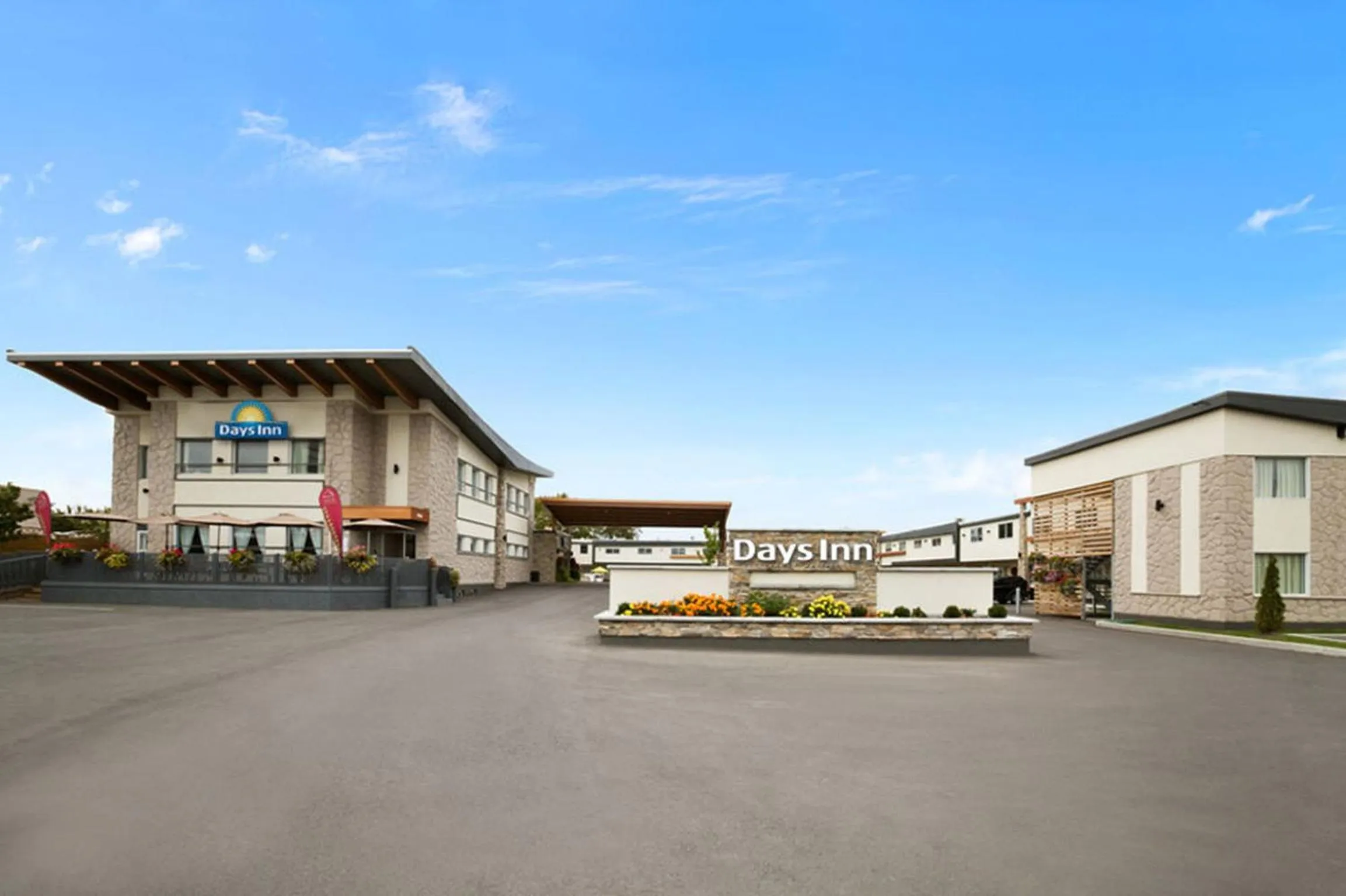 Property building in Days Inn by Wyndham Montreal East