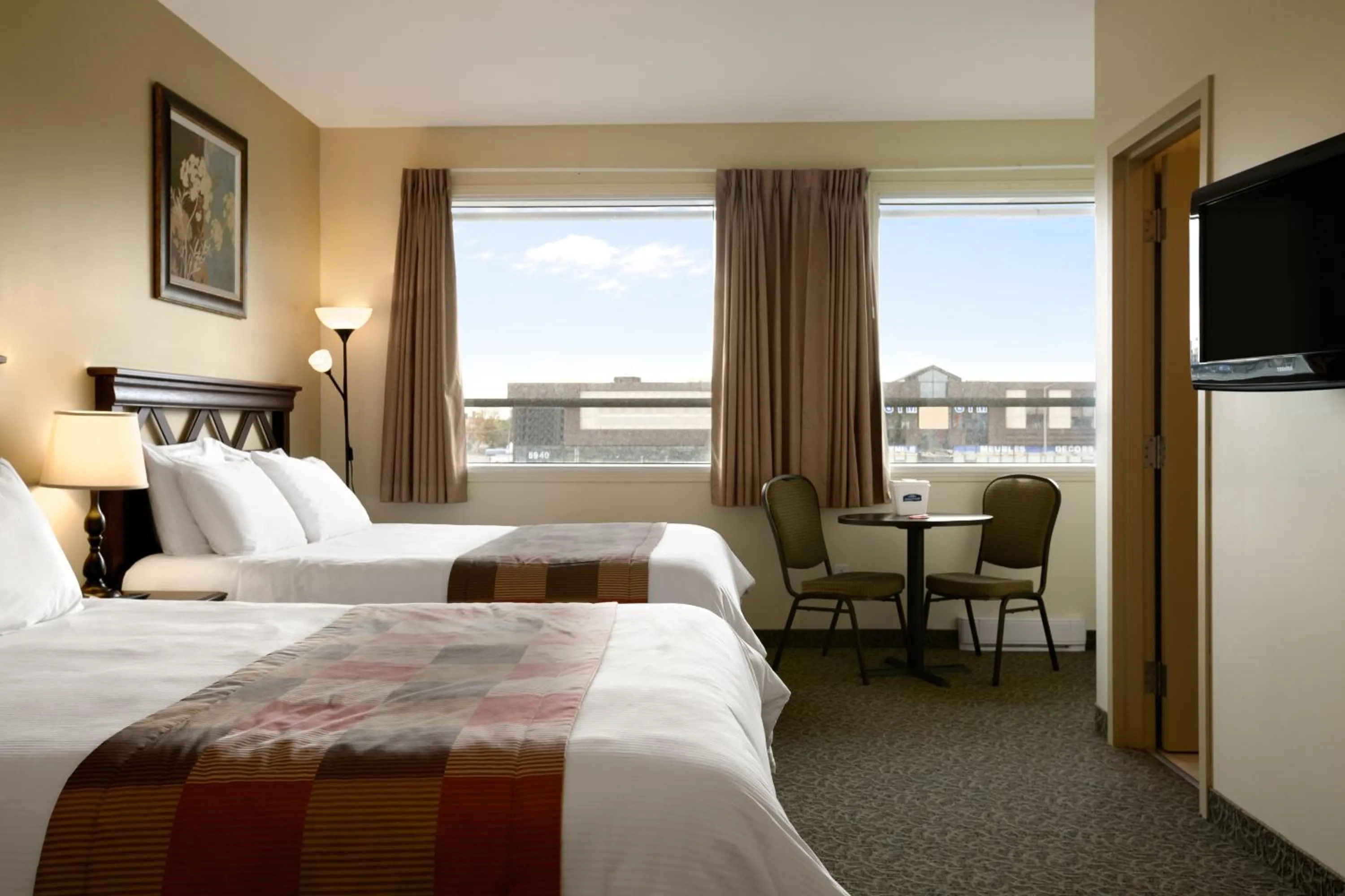 Photo of the whole room, Bed in Days Inn by Wyndham Montreal East