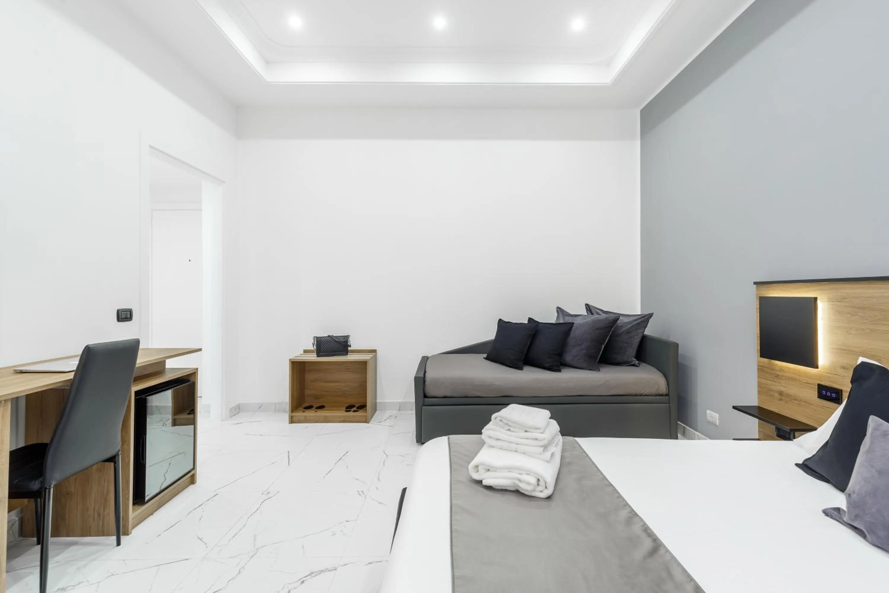 Bed in Sant'Angelo Suites