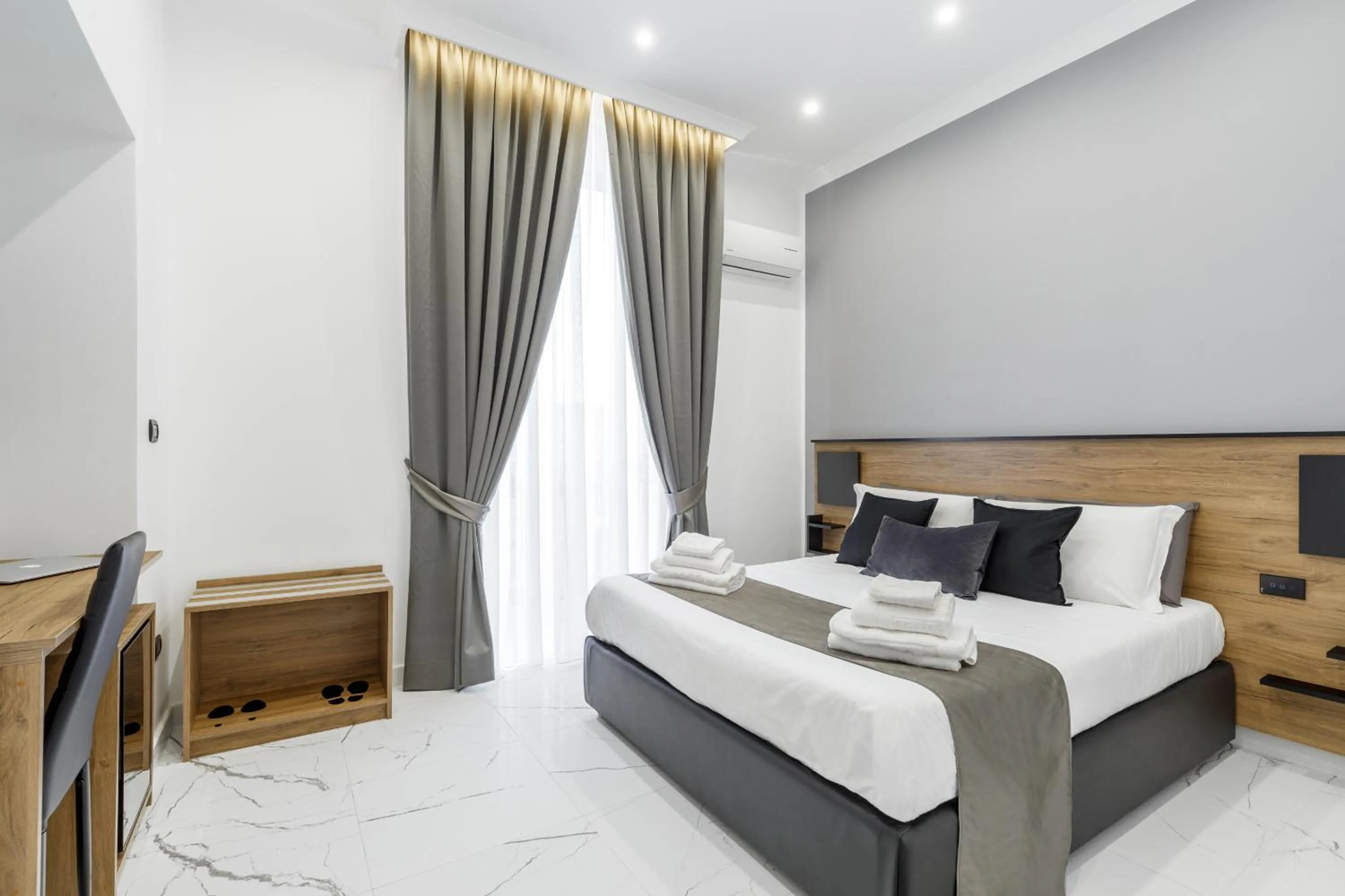 Bed in Sant'Angelo Suites