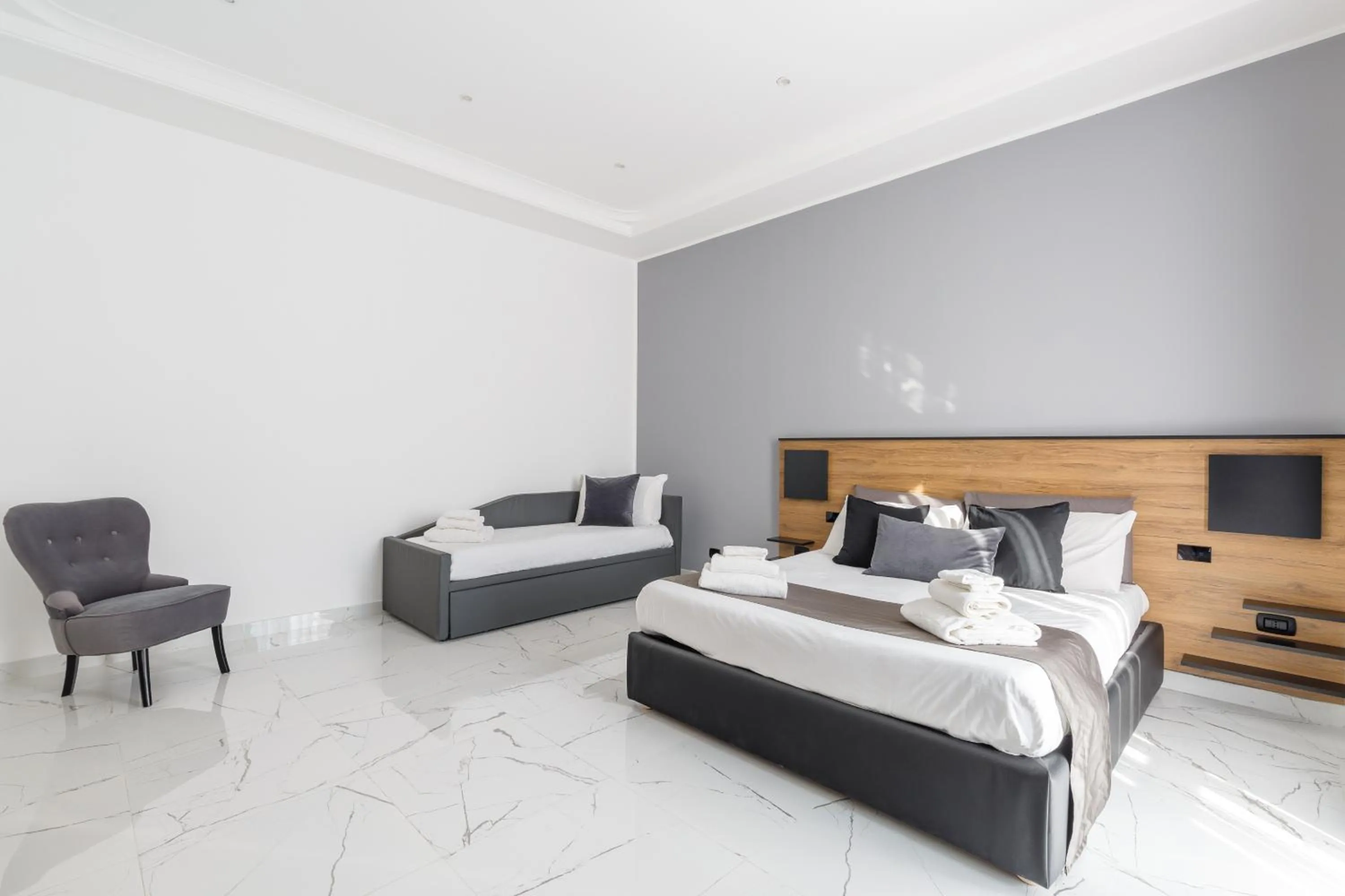 Bed in Sant'Angelo Suites