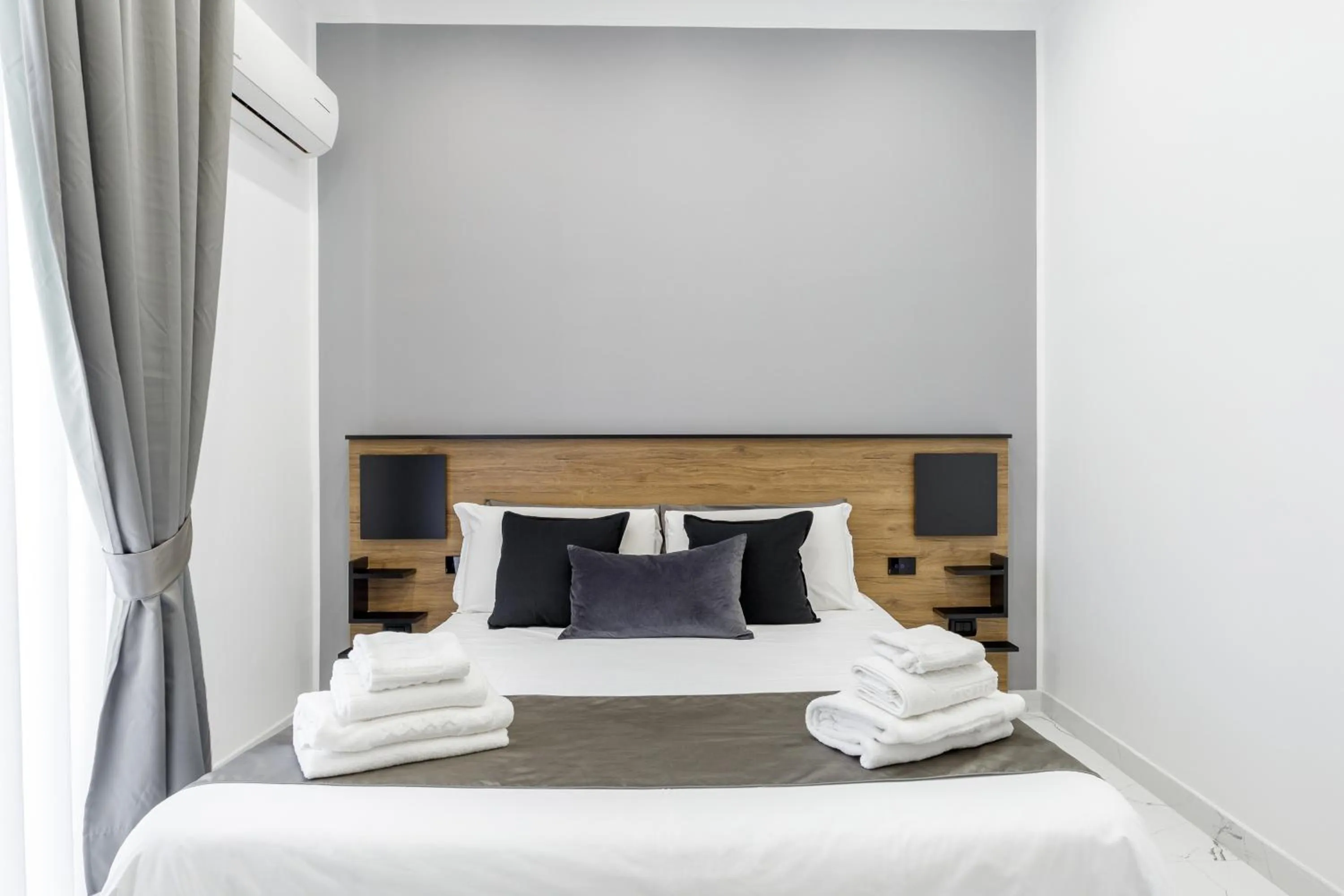 Bed in Sant'Angelo Suites