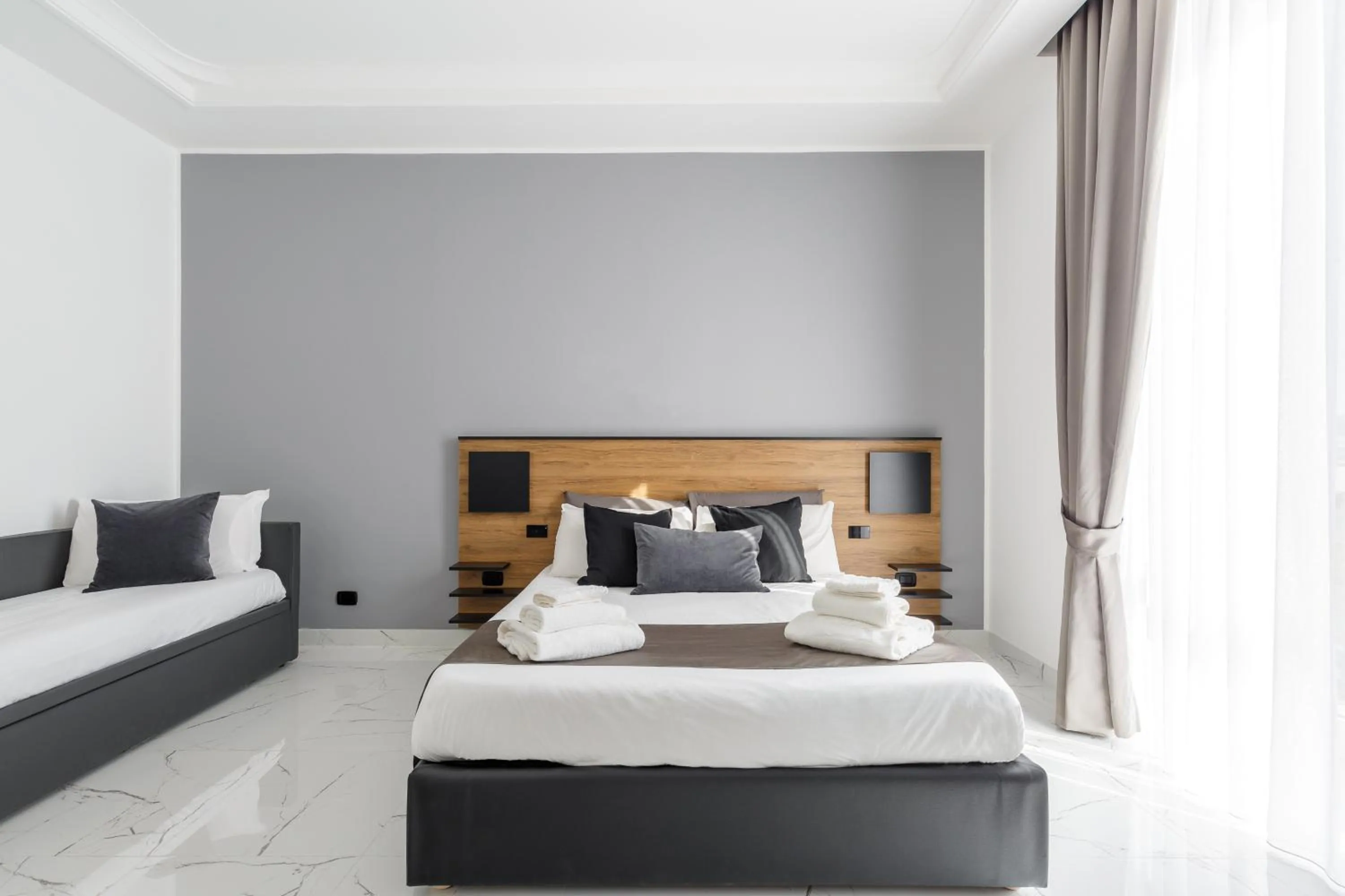 Bed in Sant'Angelo Suites