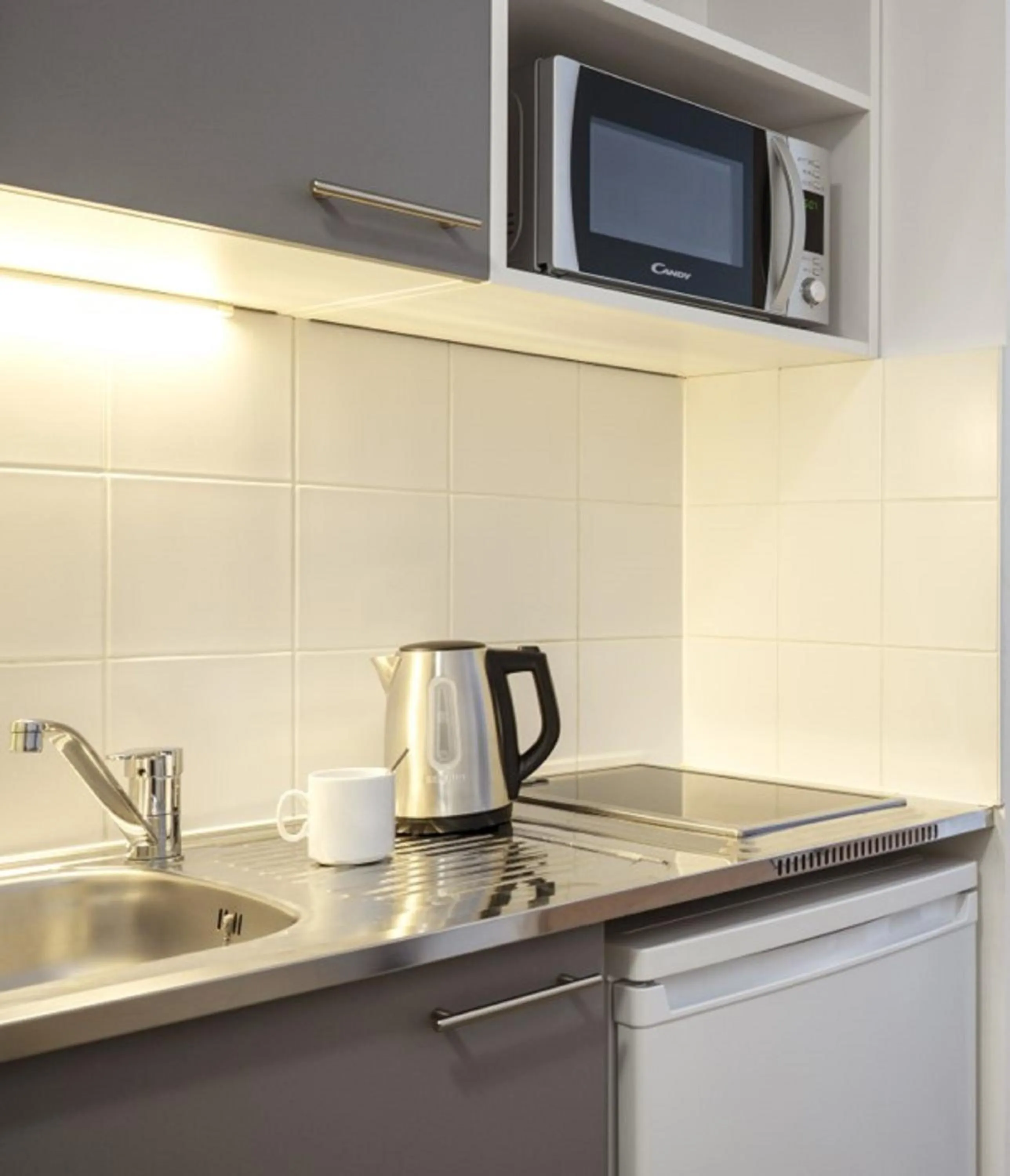 Kitchen or kitchenette in Séjours & Affaires Paris Bagnolet