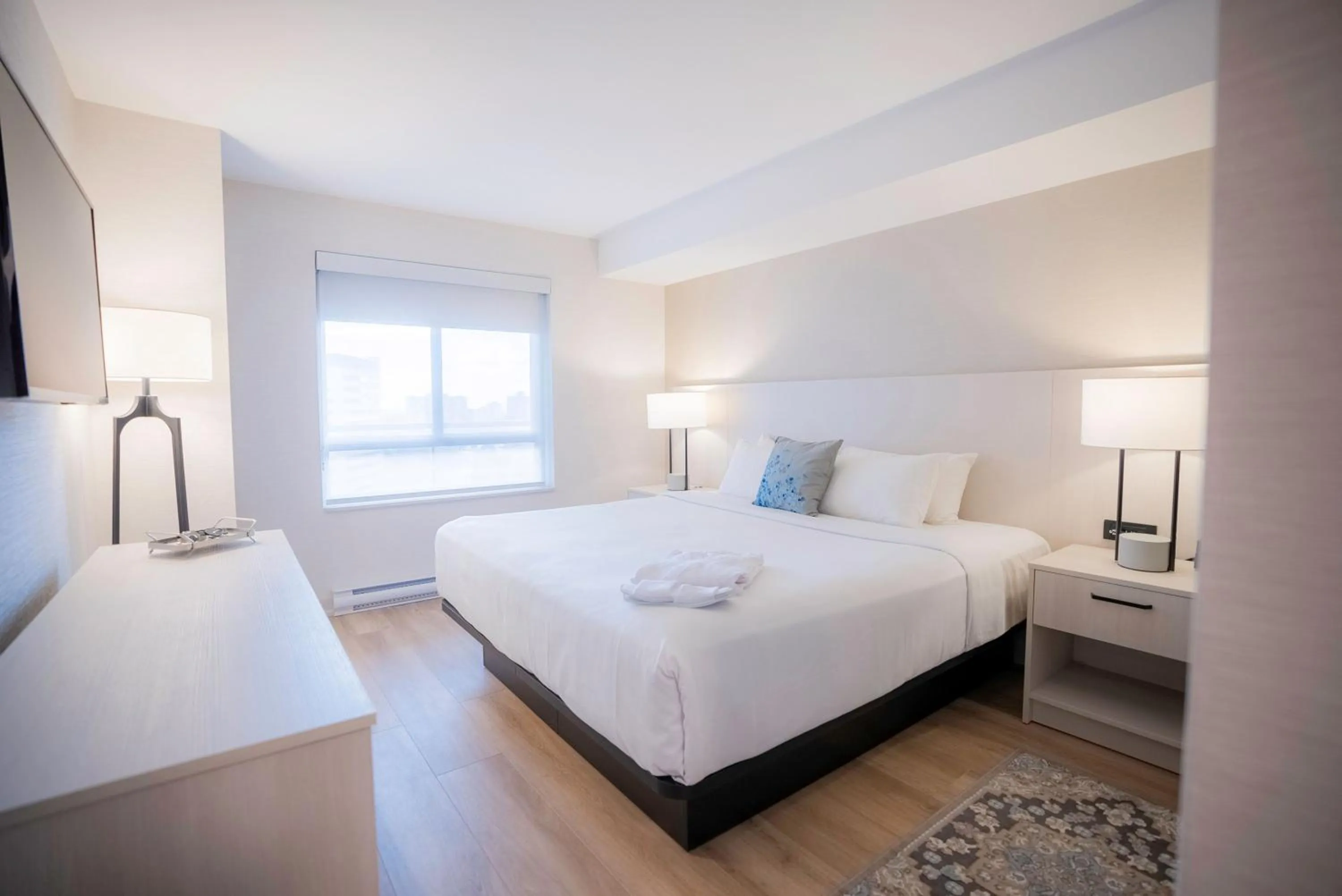 Bed in Les Suites Hotel Ottawa