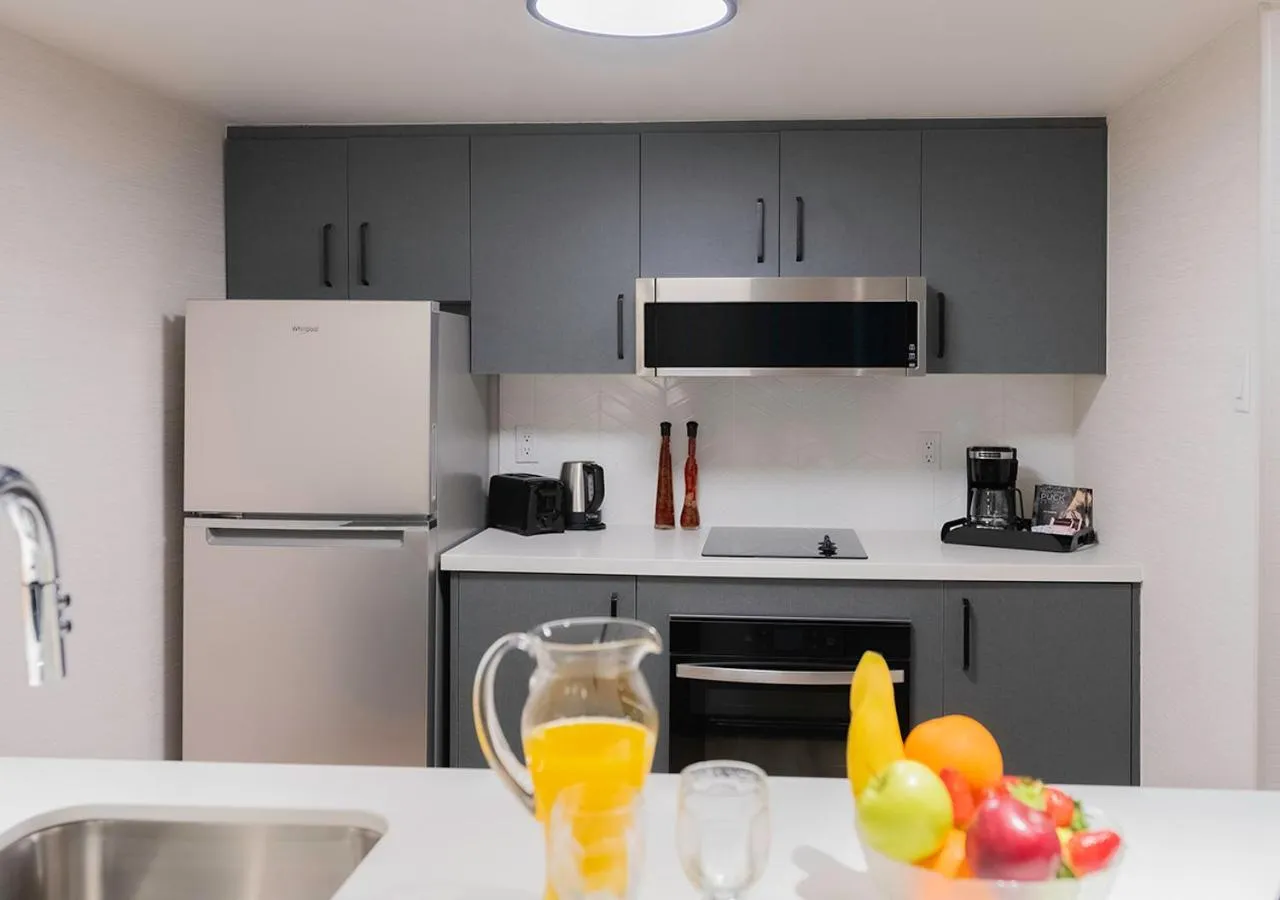 Kitchen or kitchenette in Les Suites Hotel Ottawa