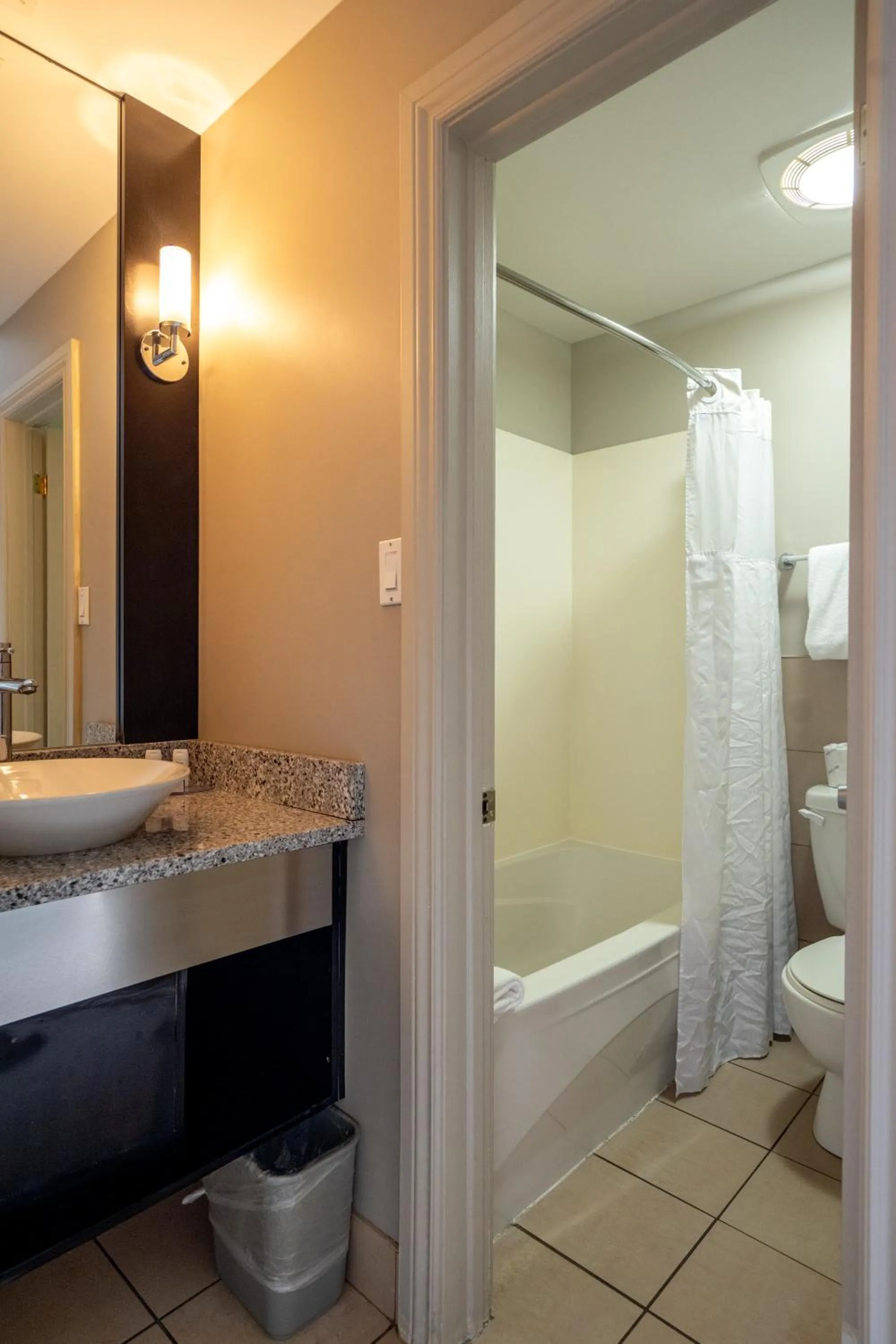 Bathroom in Ramada by Wyndham Ottawa On The Rideau