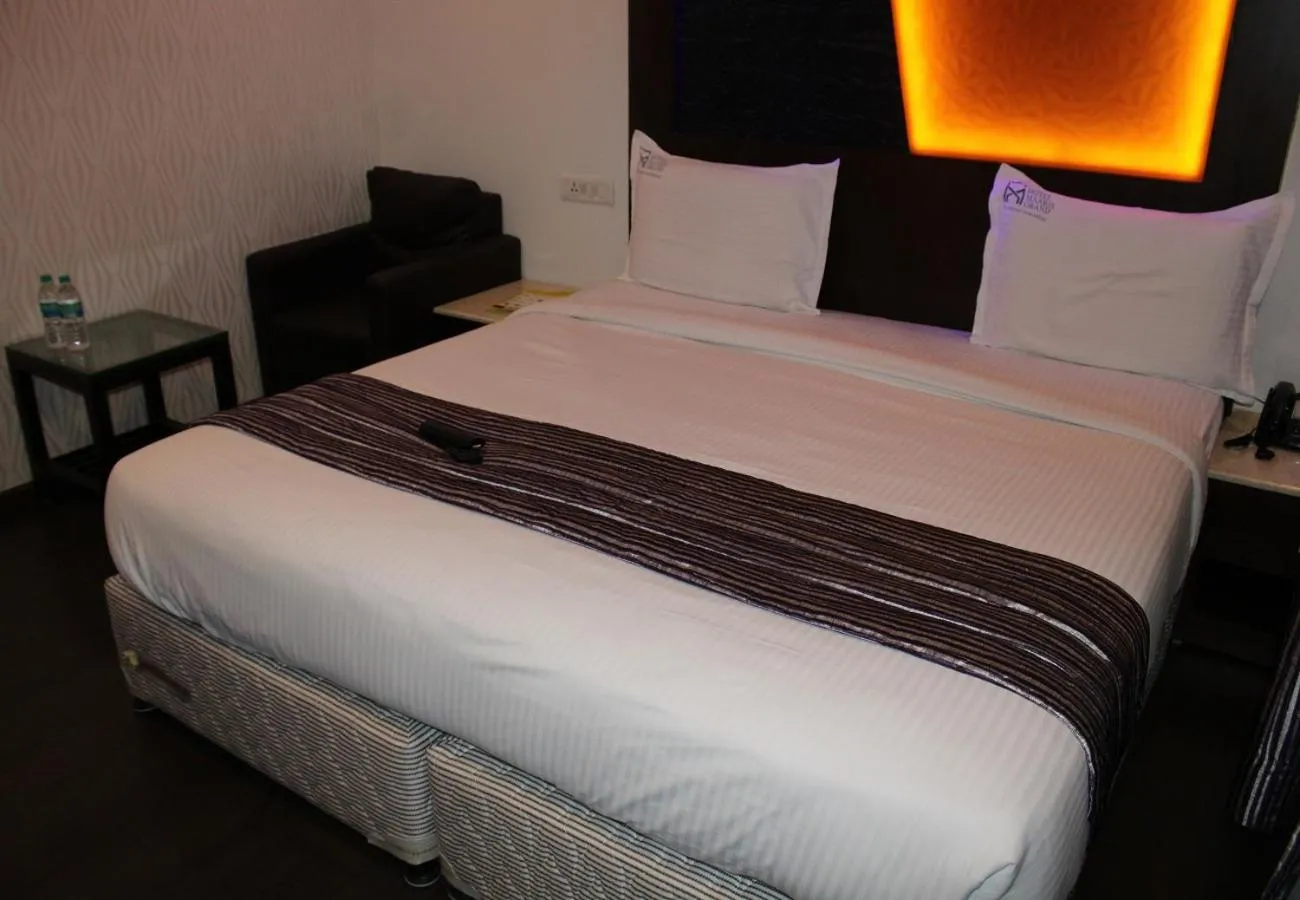 Bed in Hotel M Grand