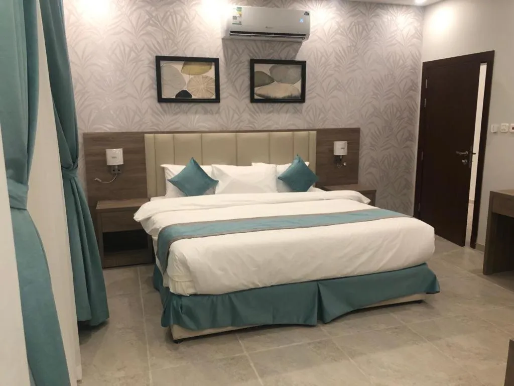Bed in Al-Haramain Family Apartments