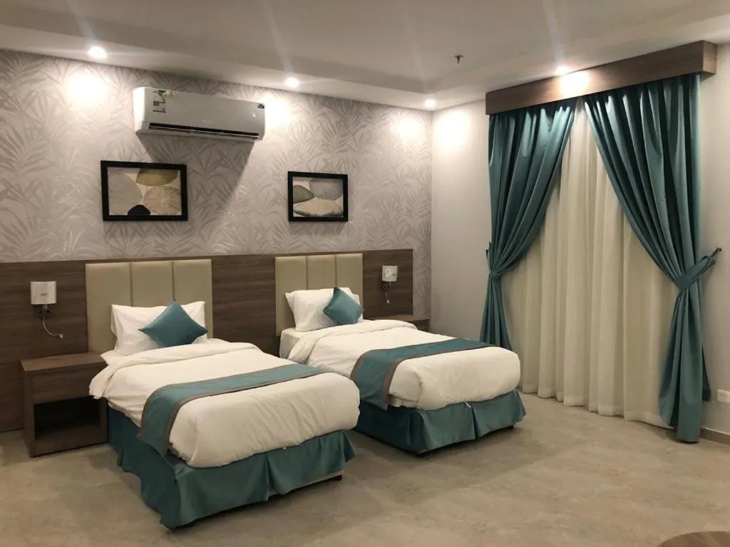 Bed in Al-Haramain Family Apartments