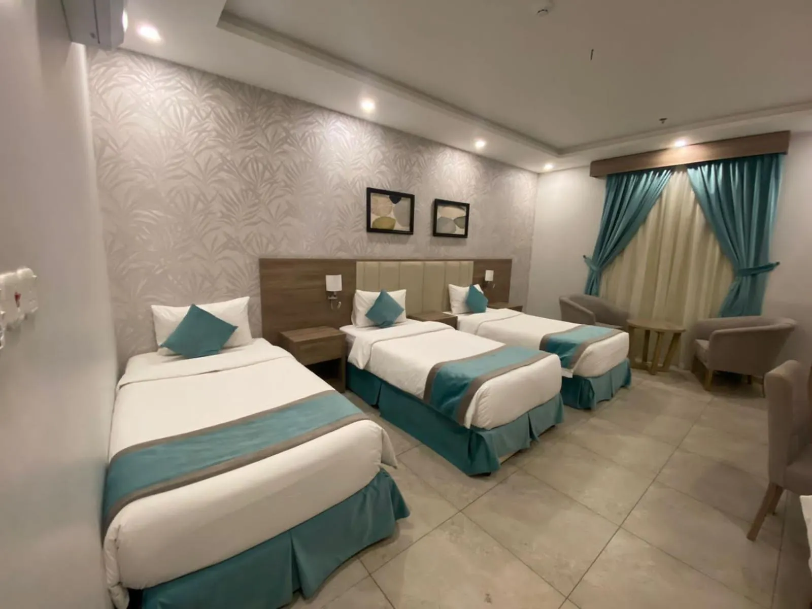 Photo of the whole room, Bed in Al-Haramain Family Apartments