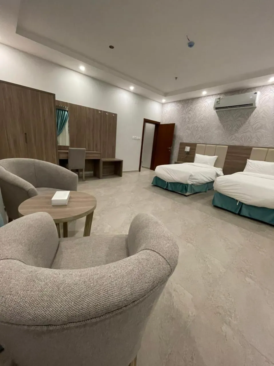Seating area, Bed in Al-Haramain Family Apartments