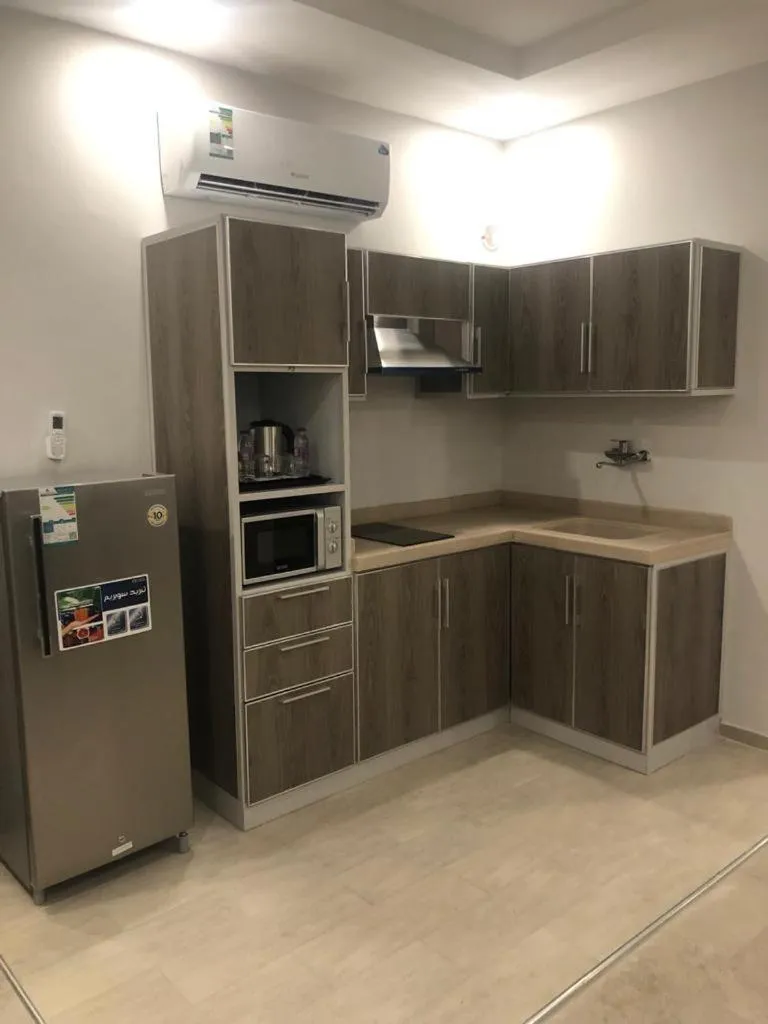 Kitchen or kitchenette in Al-Haramain Family Apartments