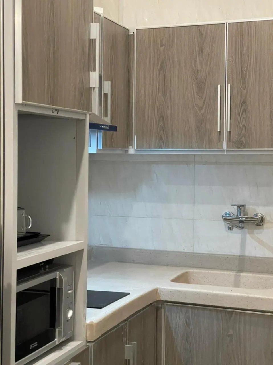 Kitchen or kitchenette in Al-Haramain Family Apartments