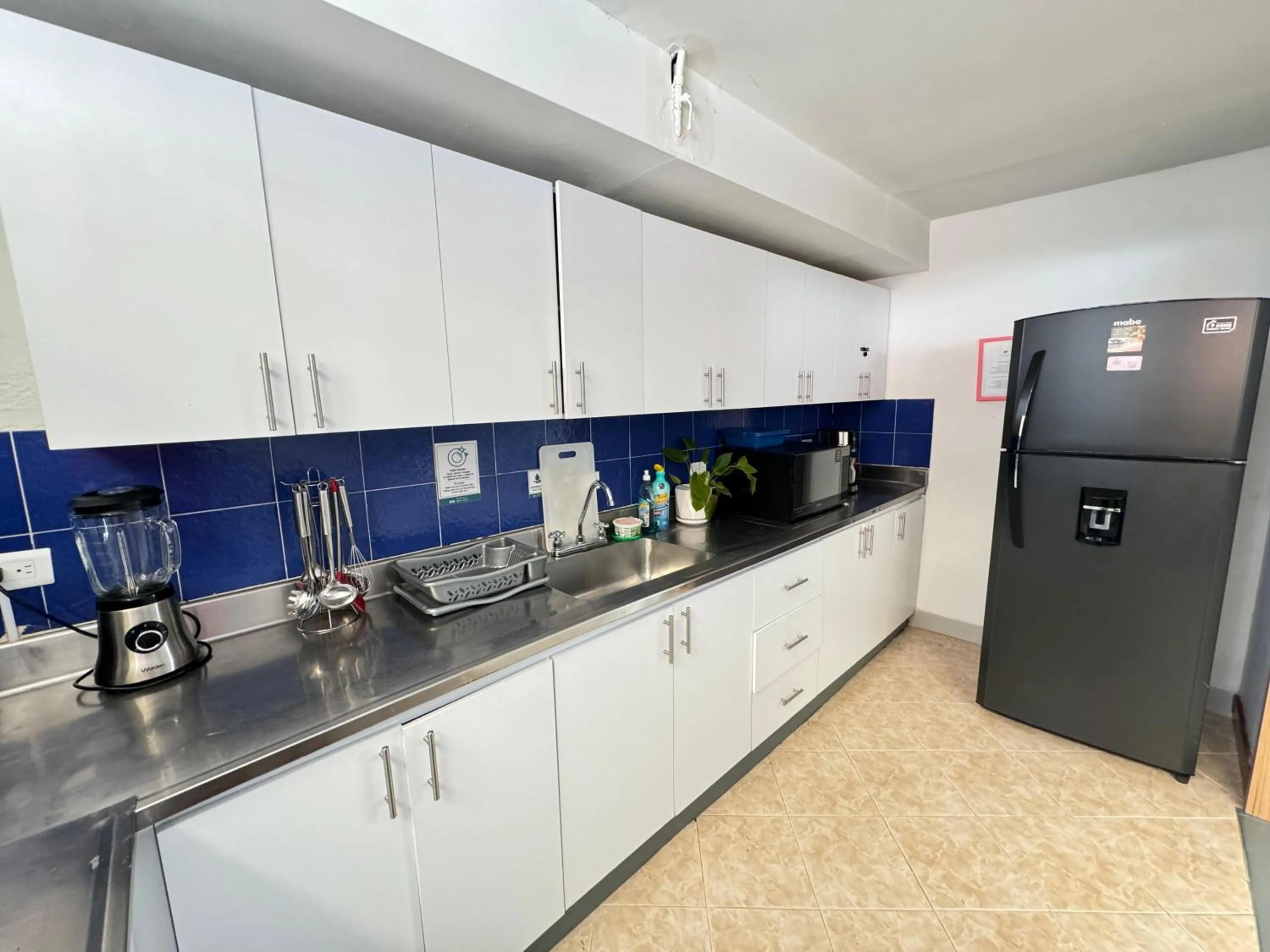 Kitchen or kitchenette in Poblado Park Guest House