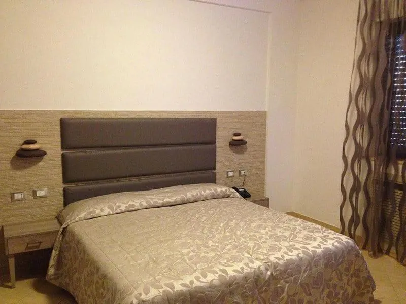 Bedroom, Bed in Villa Adriana Hotel