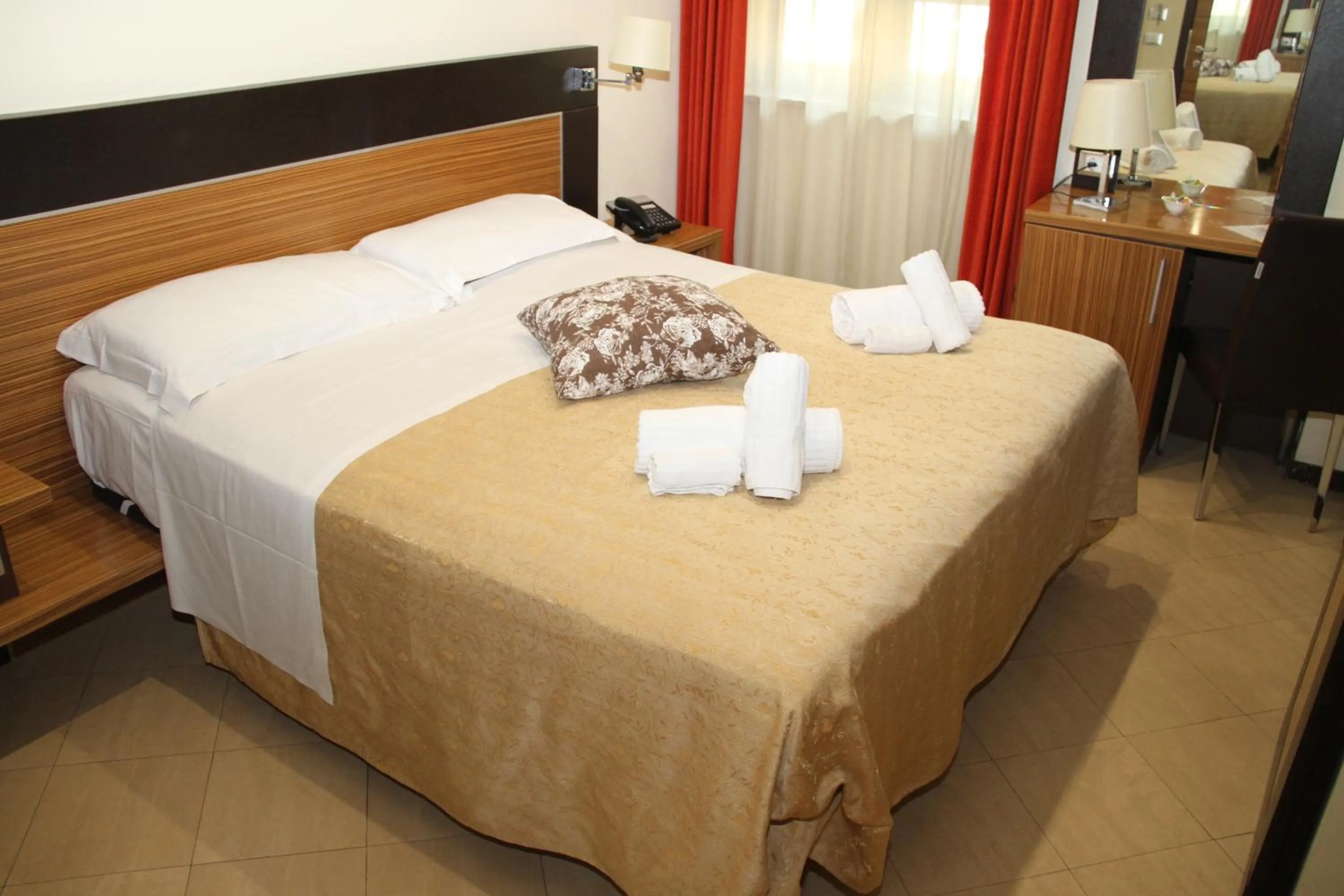 Bed in Villa Adriana Hotel
