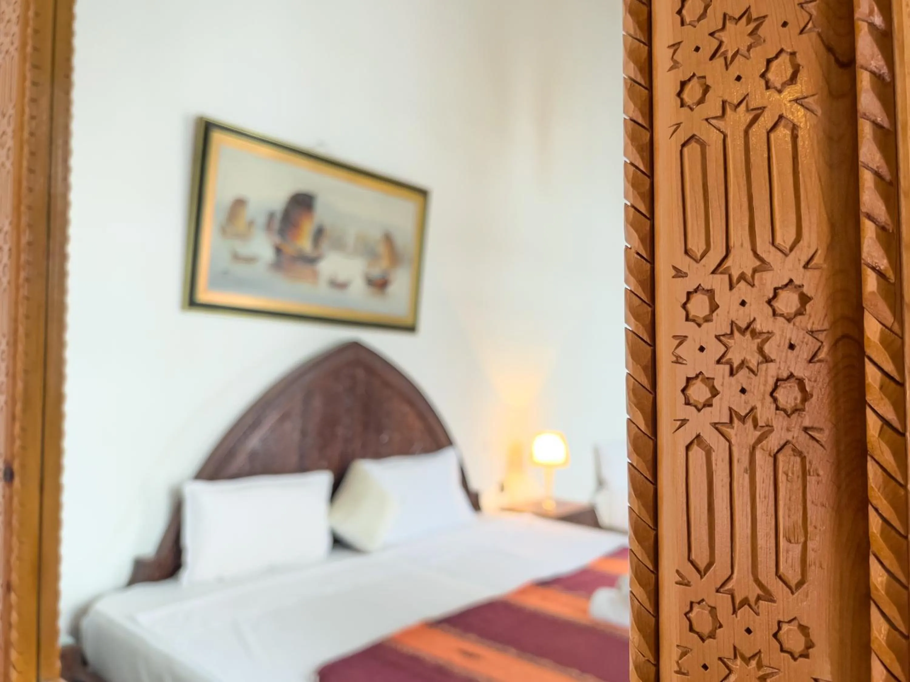 Bed in Riad Pacha Palace