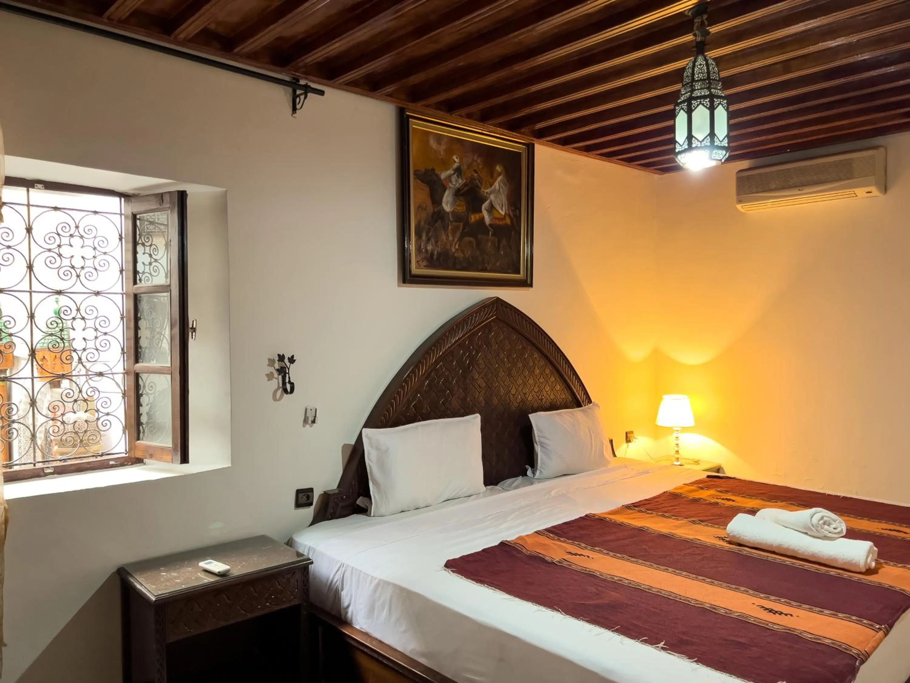 Photo of the whole room, Bed in Riad Pacha Palace
