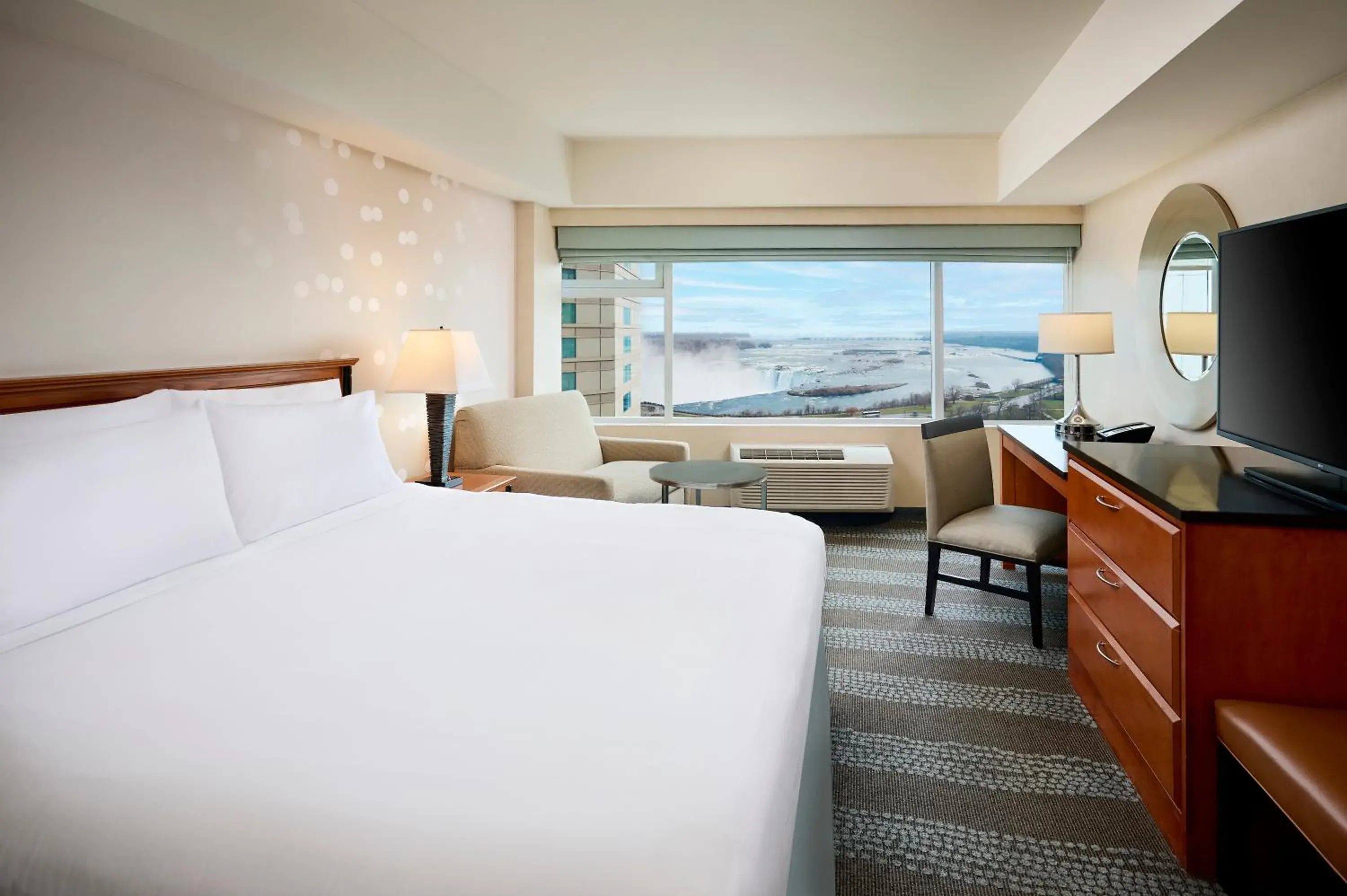 Standard King Room with Falls View and Jetted Tub in Niagara Fallsview Hotel & Suites Standard King Room with Falls View and Jetted Tub in Niagara Fallsview Hotel & Suites