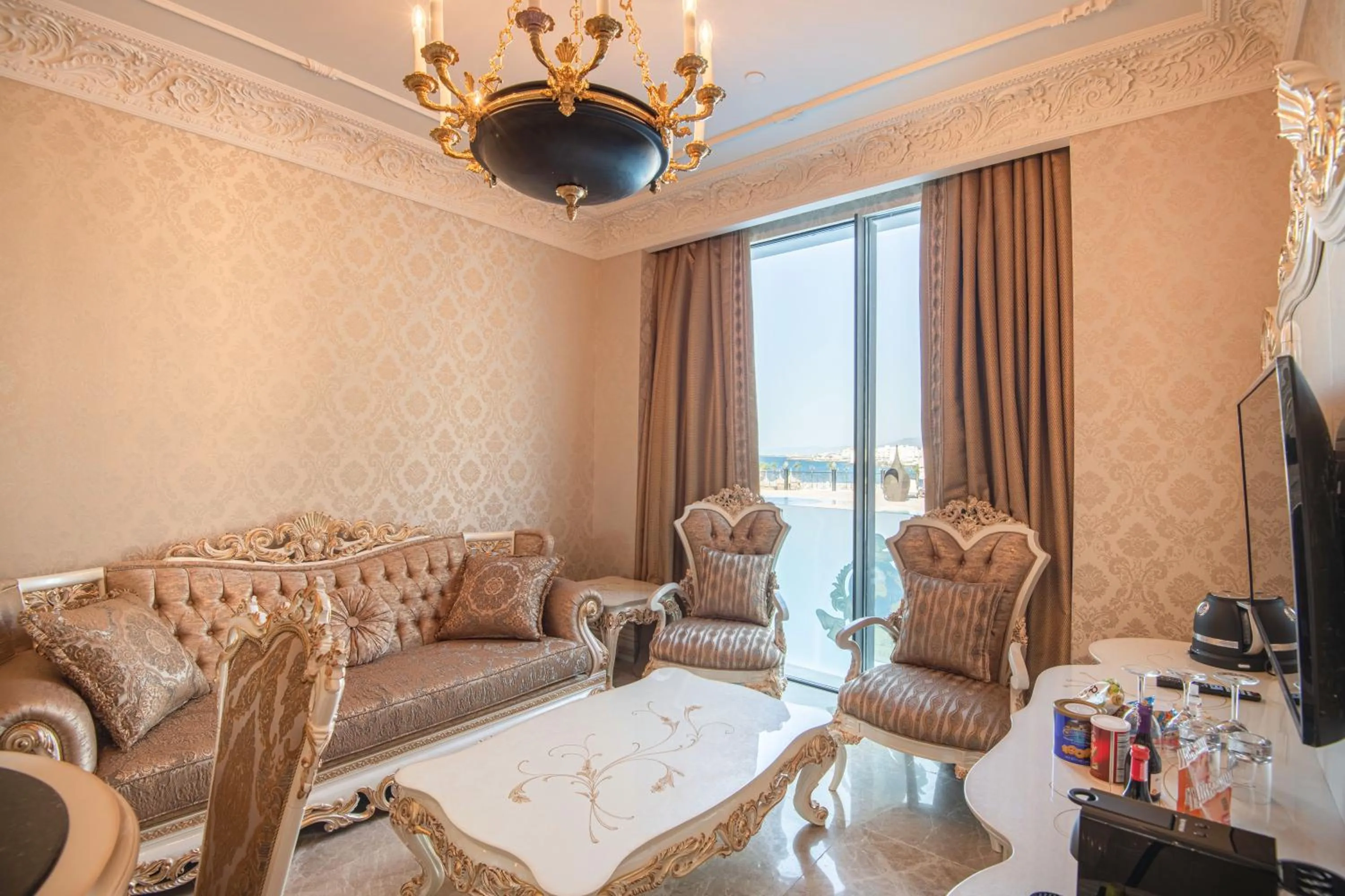 Living room in Les Ambassadeurs Hotel Casino&Marina