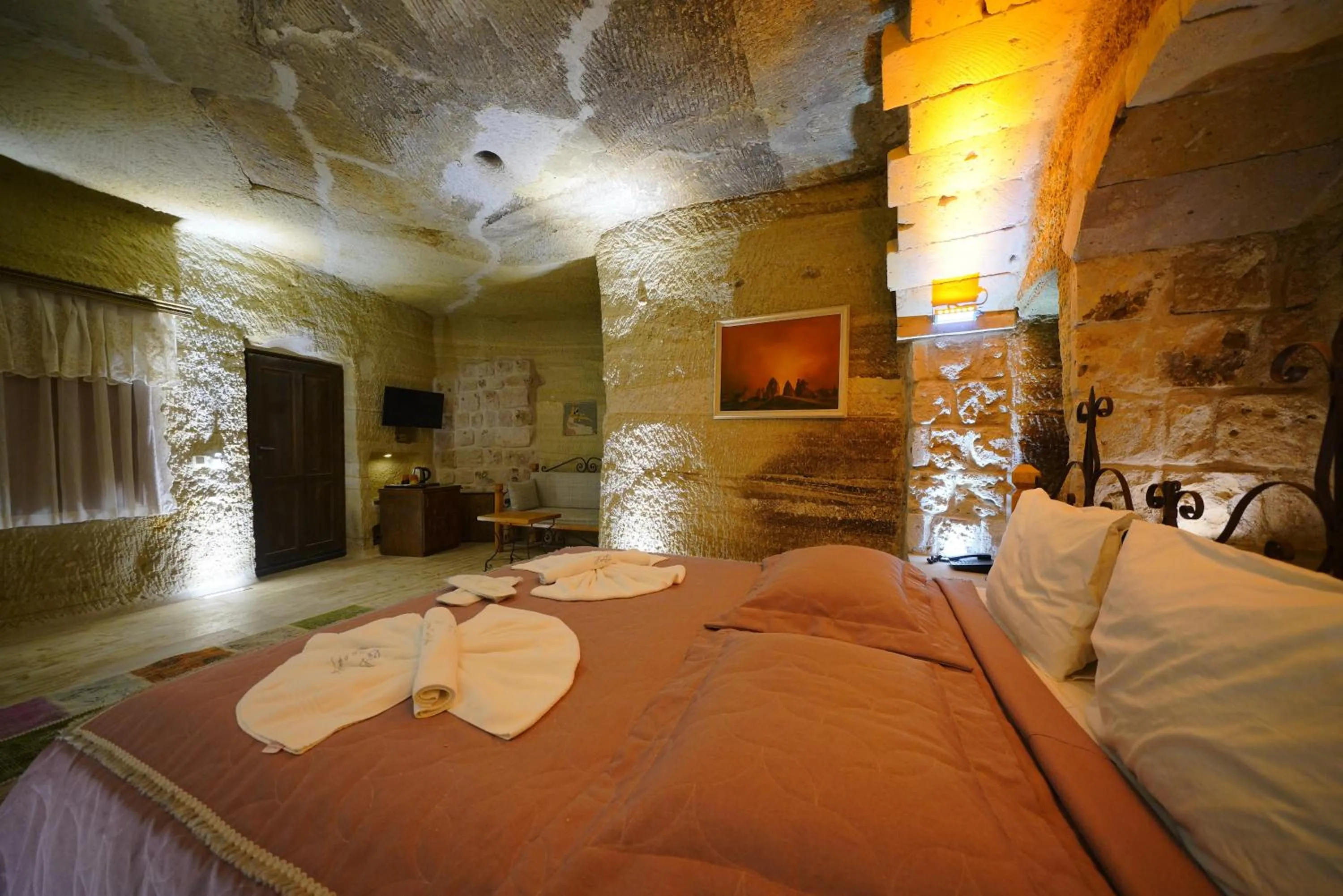 Bed in Göreme Cave Lodge