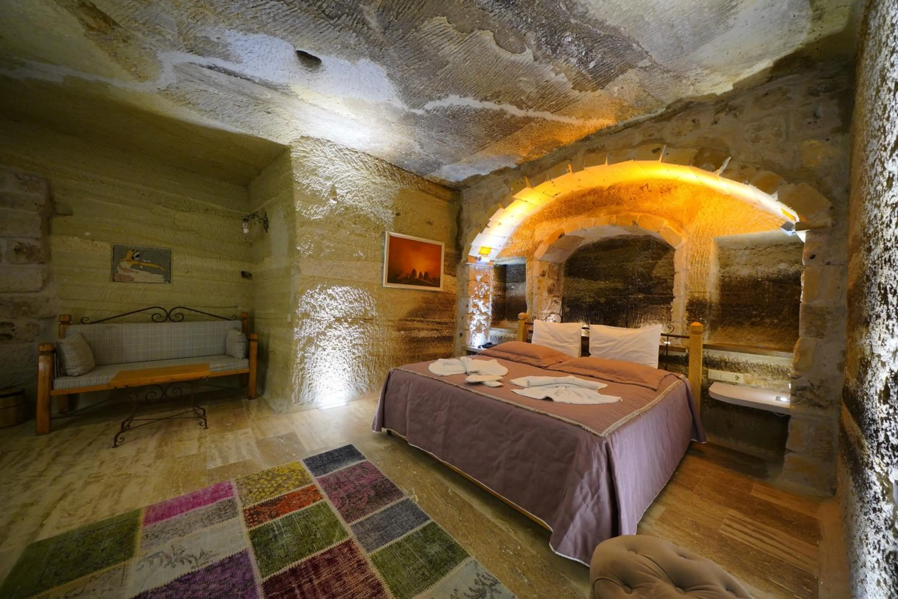 Bed in Göreme Cave Lodge