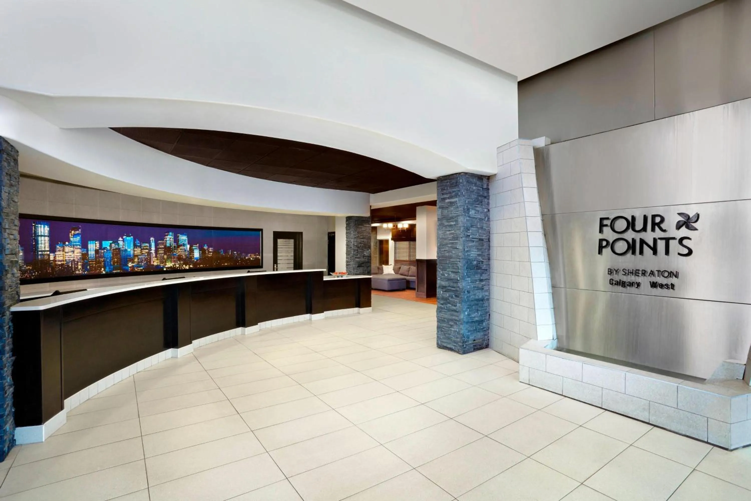 Lobby or reception in Four Points by Sheraton Hotel & Suites Calgary West