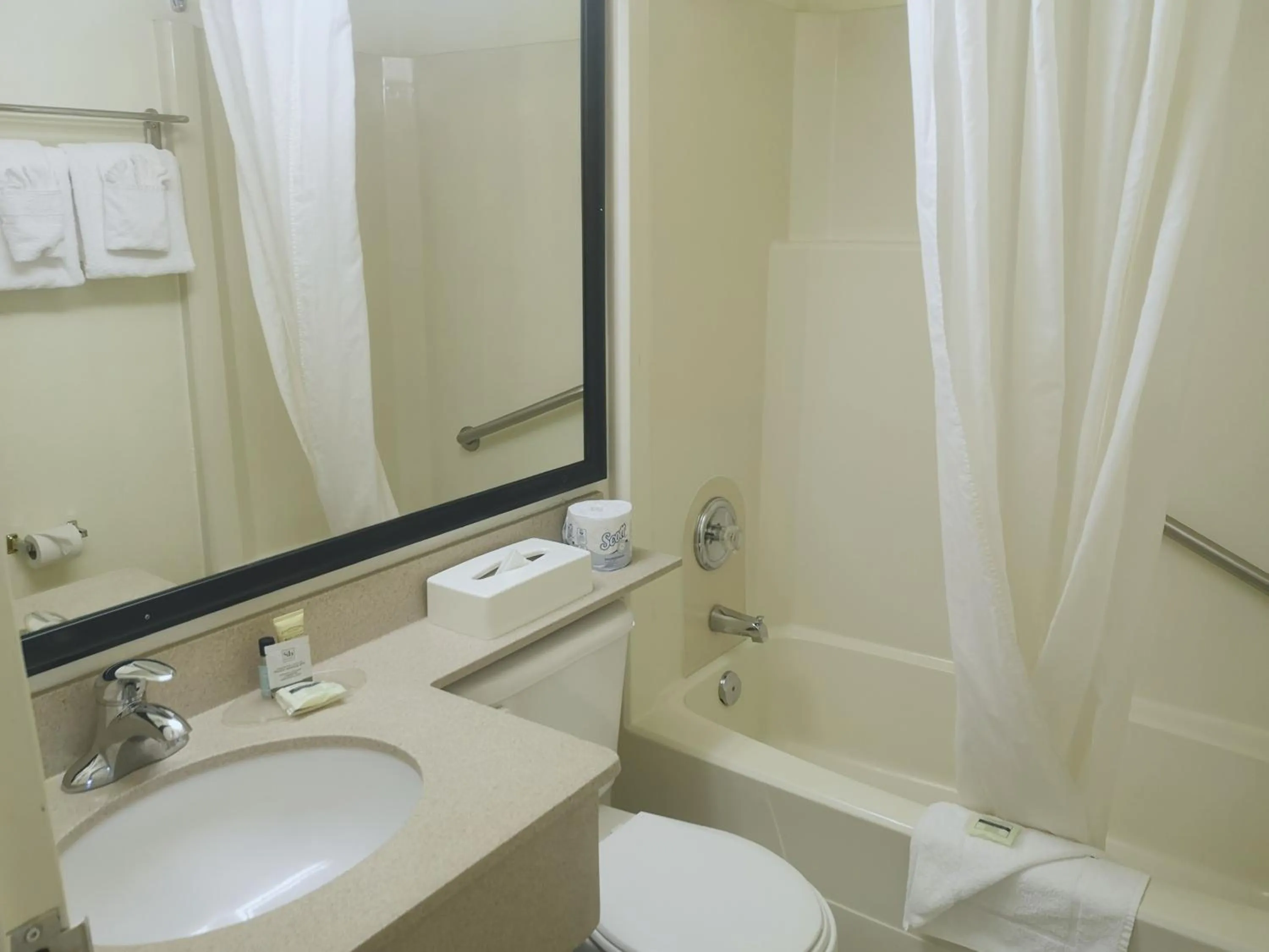 Bathroom in Travelodge by Wyndham Edmonton West