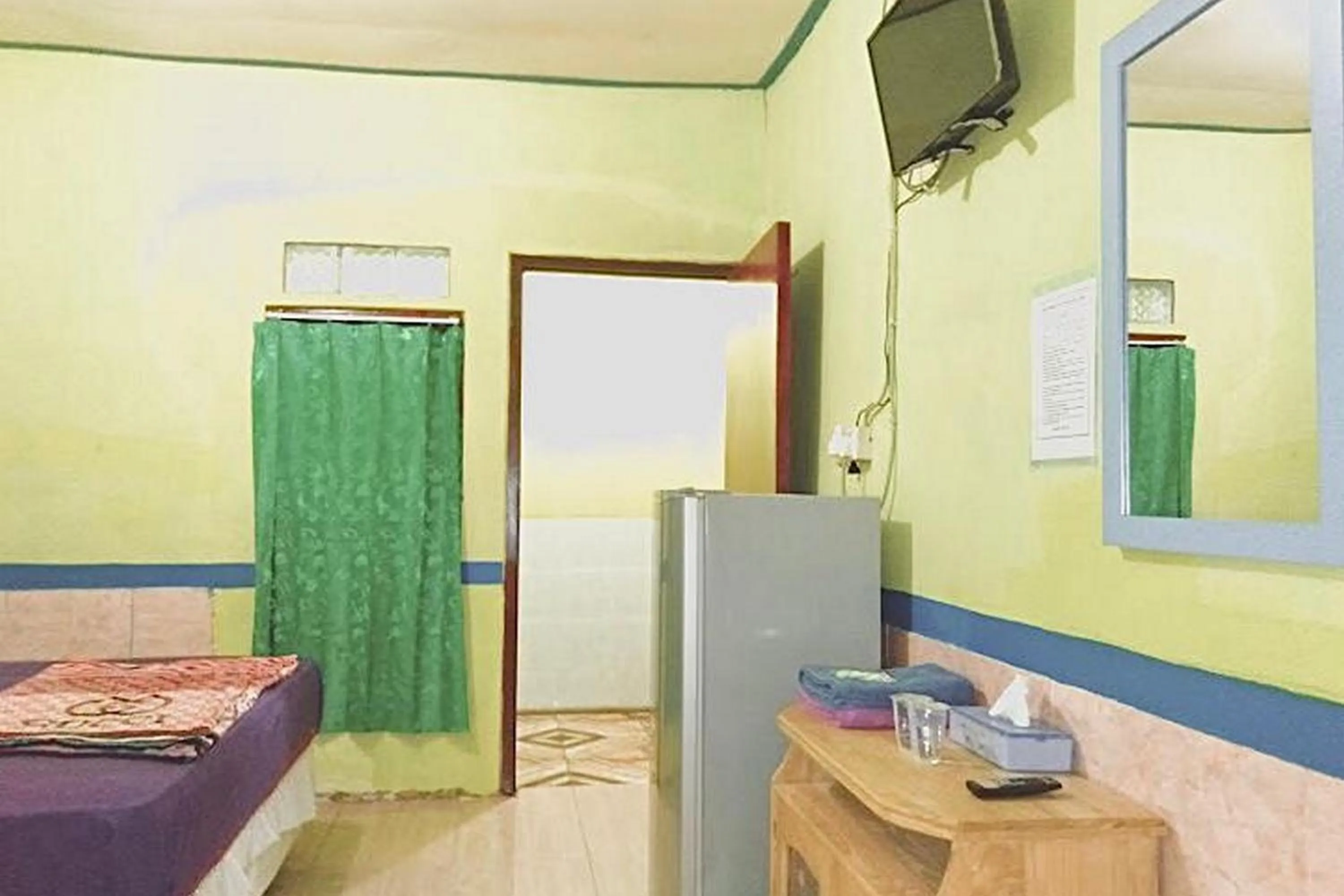 Bedroom, Bed in Hotel Indah Grogot Syariah Mitra RedDoorz