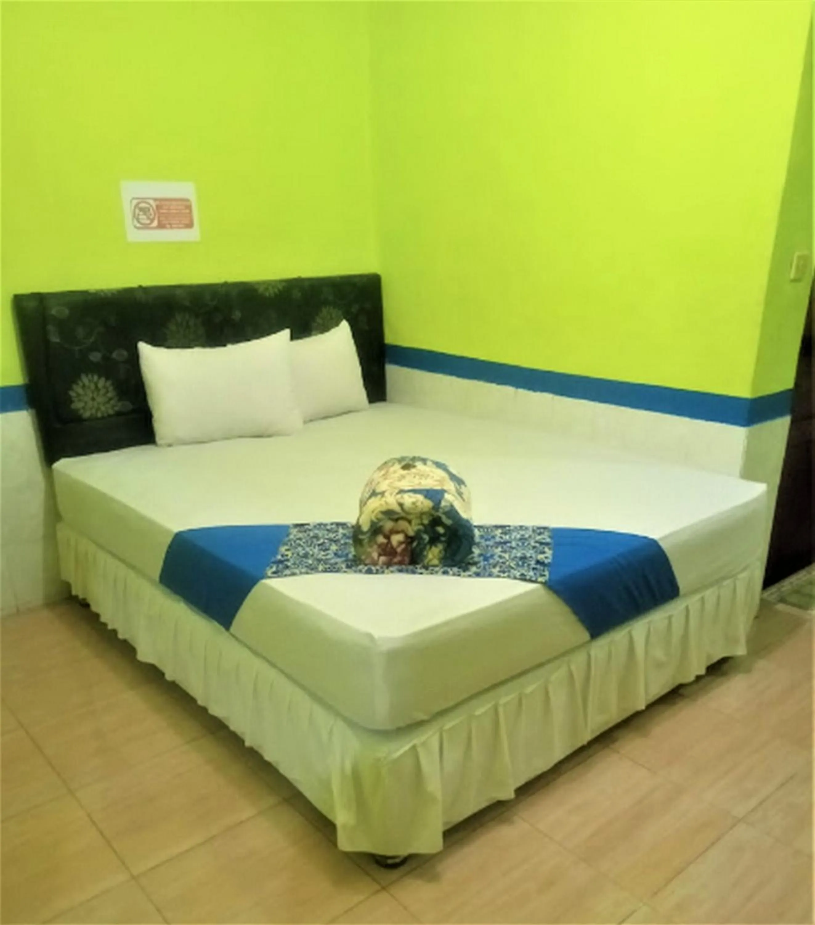 Photo of the whole room, Bed in Hotel Indah Grogot Syariah Mitra RedDoorz
