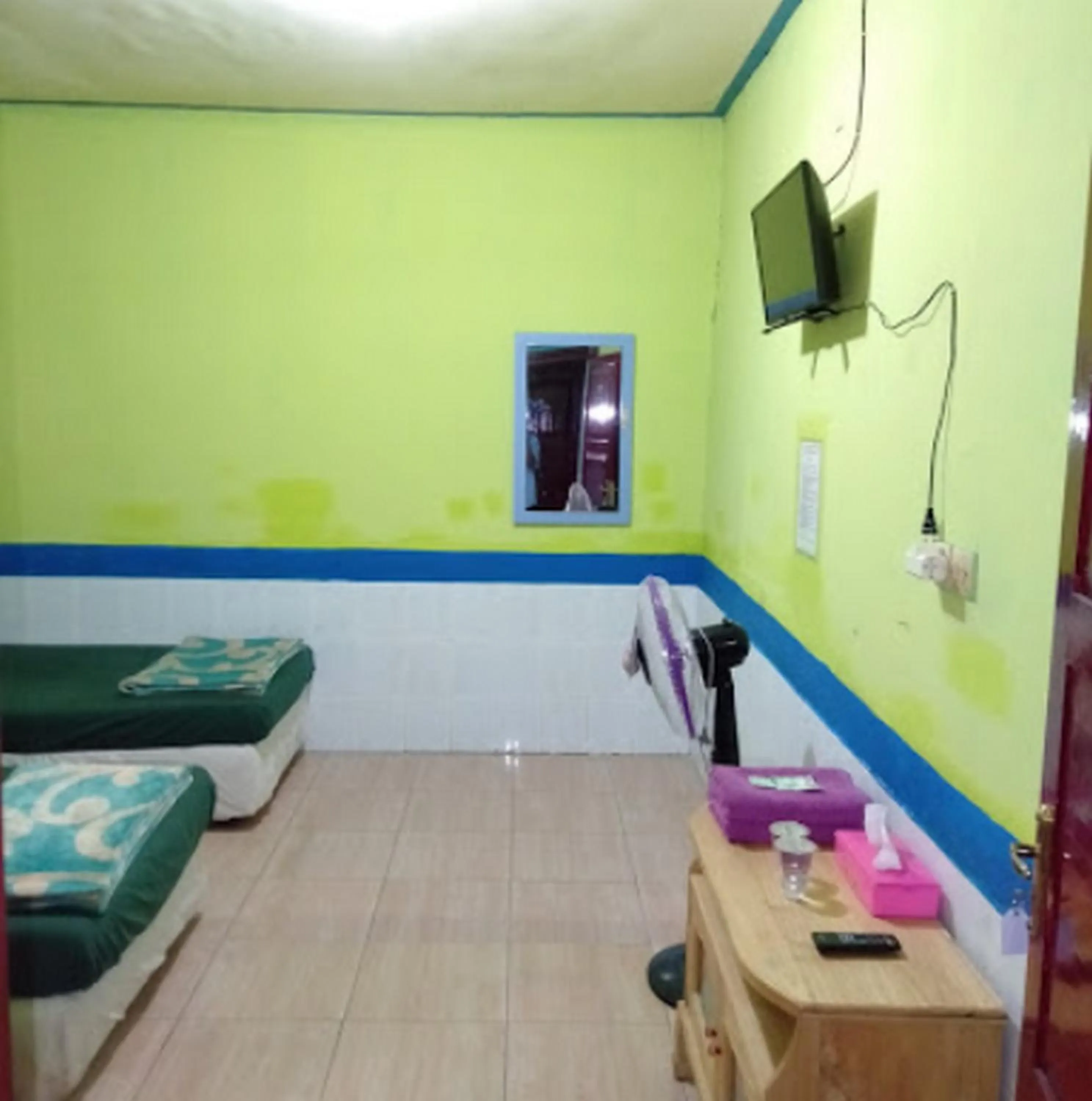 Bedroom, Bed in Hotel Indah Grogot Syariah Mitra RedDoorz