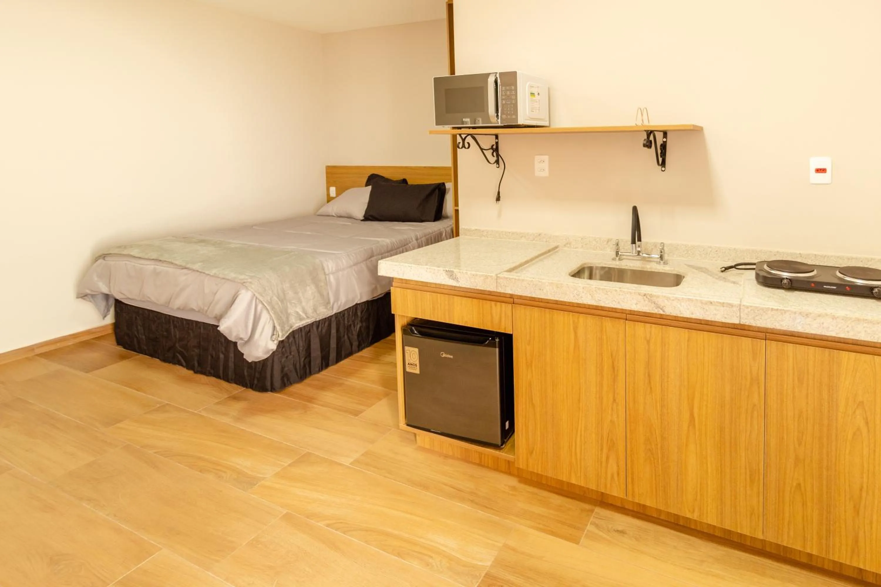 Kitchen or kitchenette, Bed in Pousada Vovó Teresa