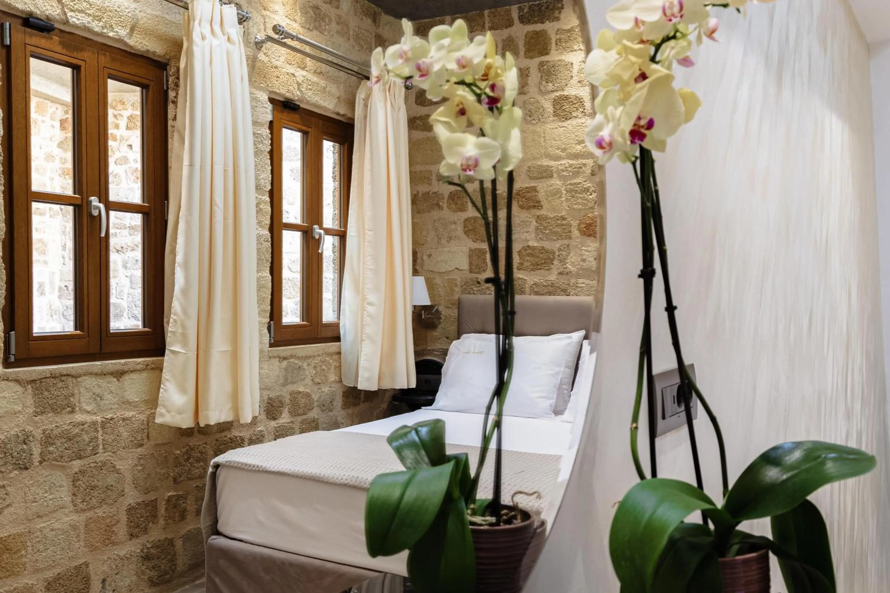 Bed in Chateau Anax Boutique Hotel