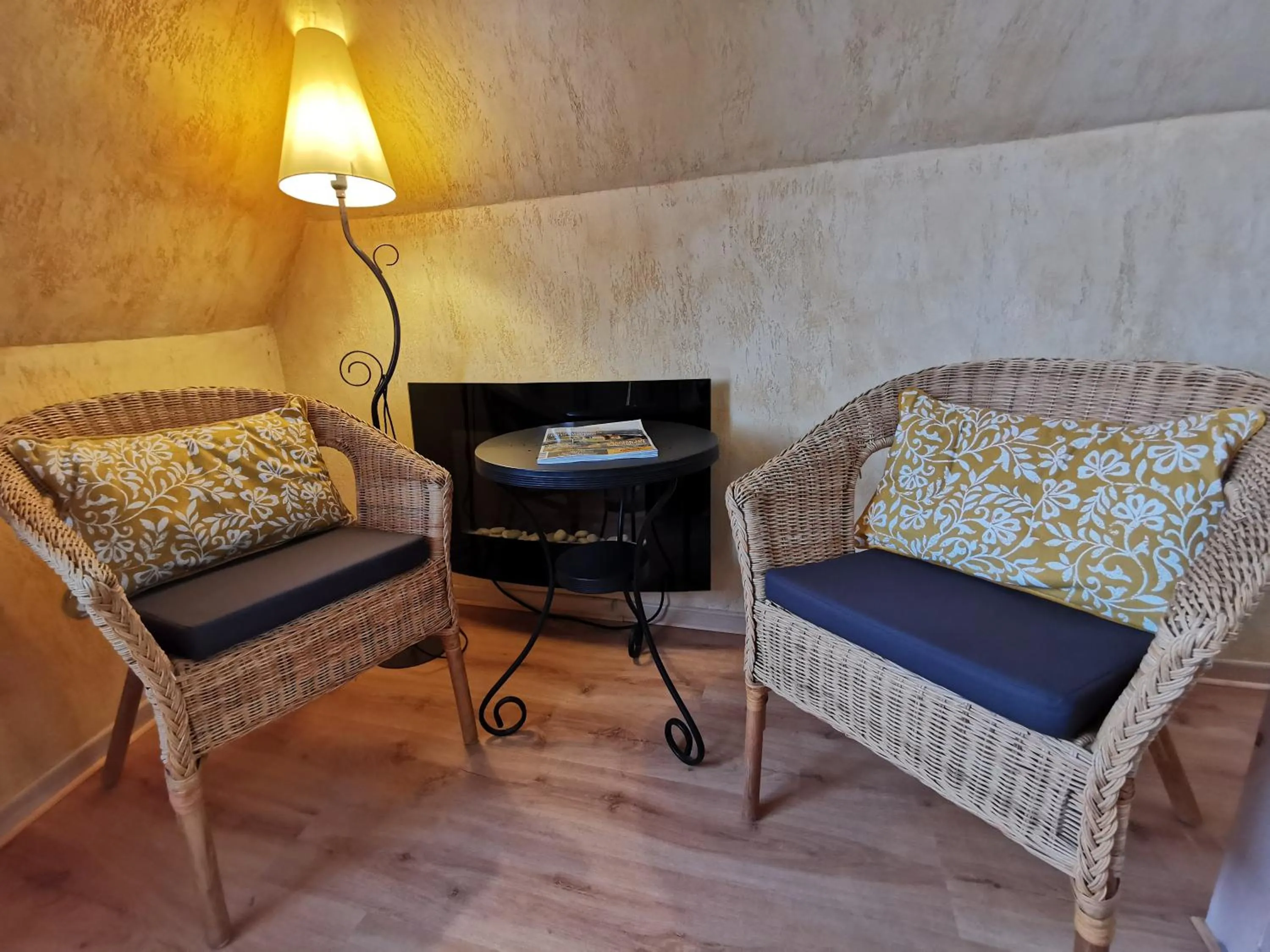 Seating area in Gîtes Un Jardin dans la Falaise
