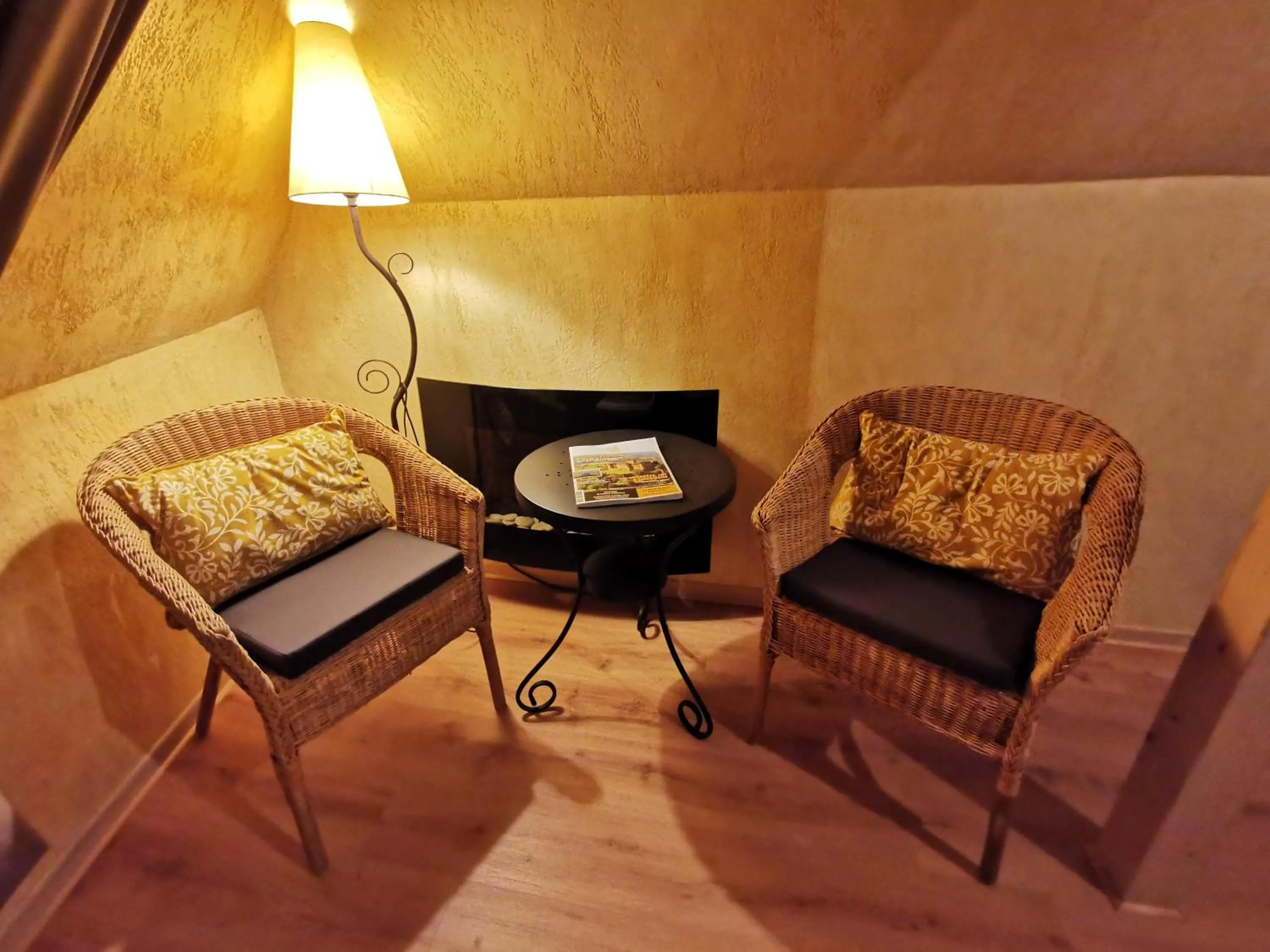 Seating area in Gîtes Un Jardin dans la Falaise