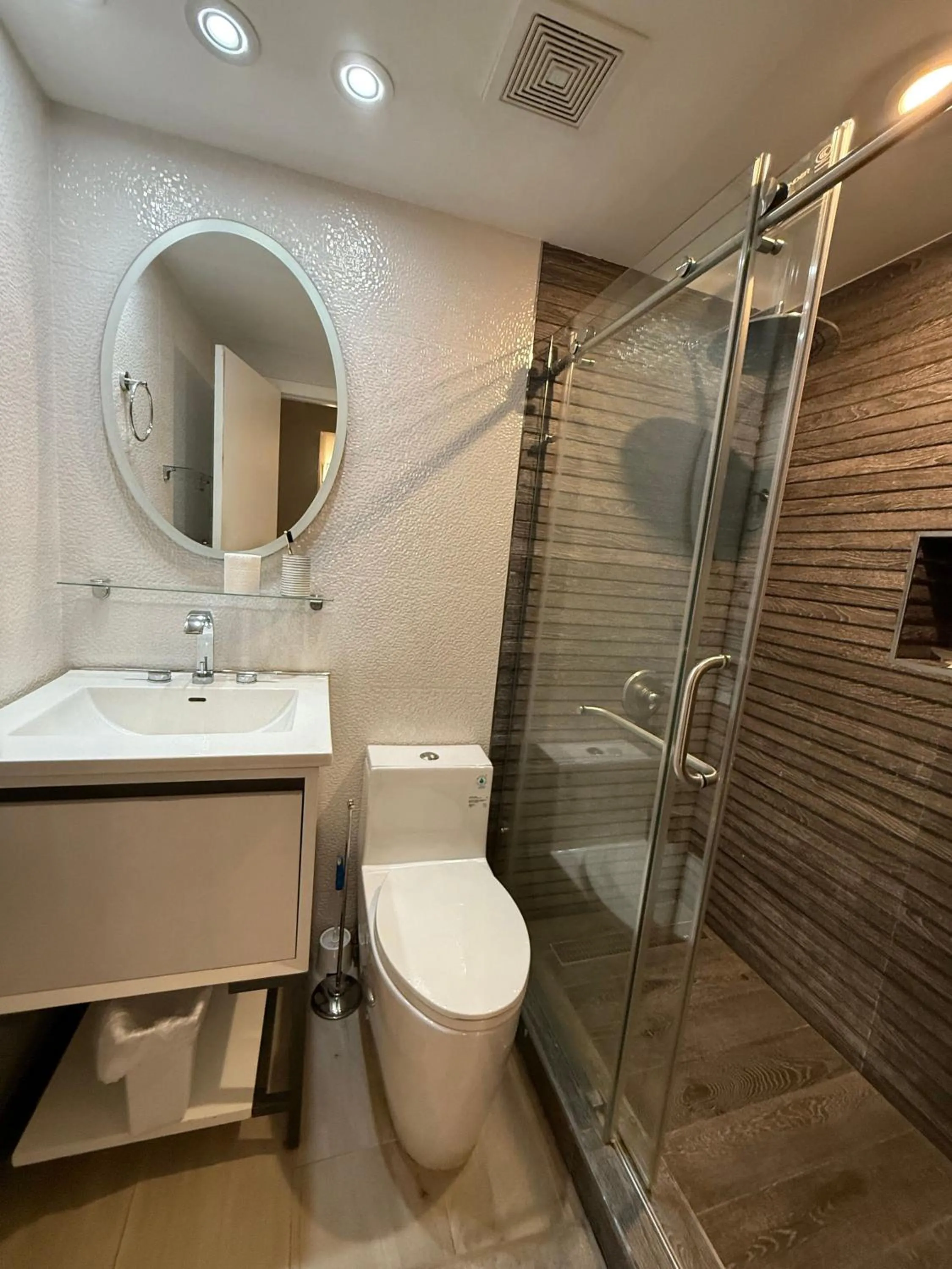 Shower in SeaStays Apartments