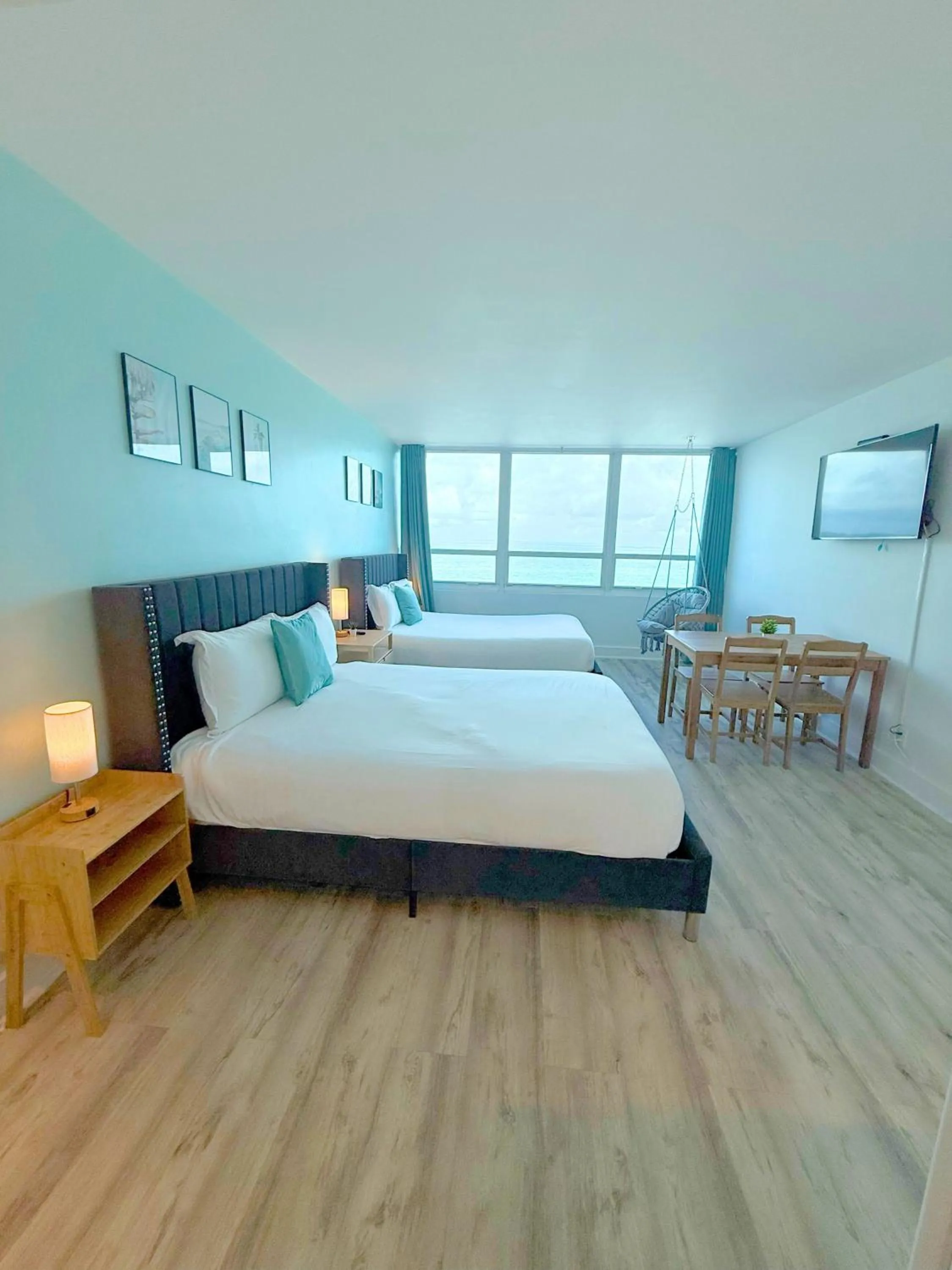 Bed in SeaStays Apartments