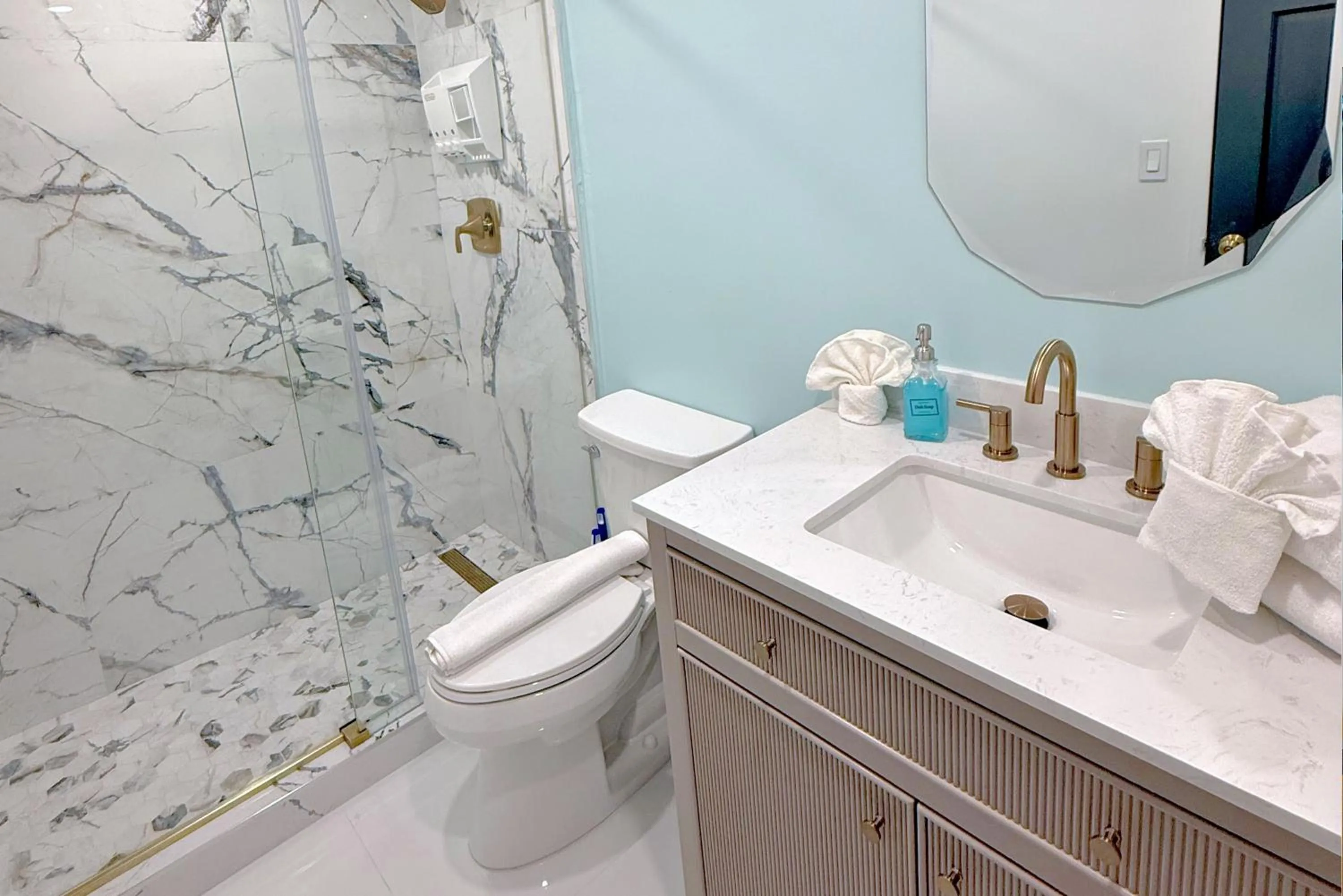 Shower in SeaStays Apartments