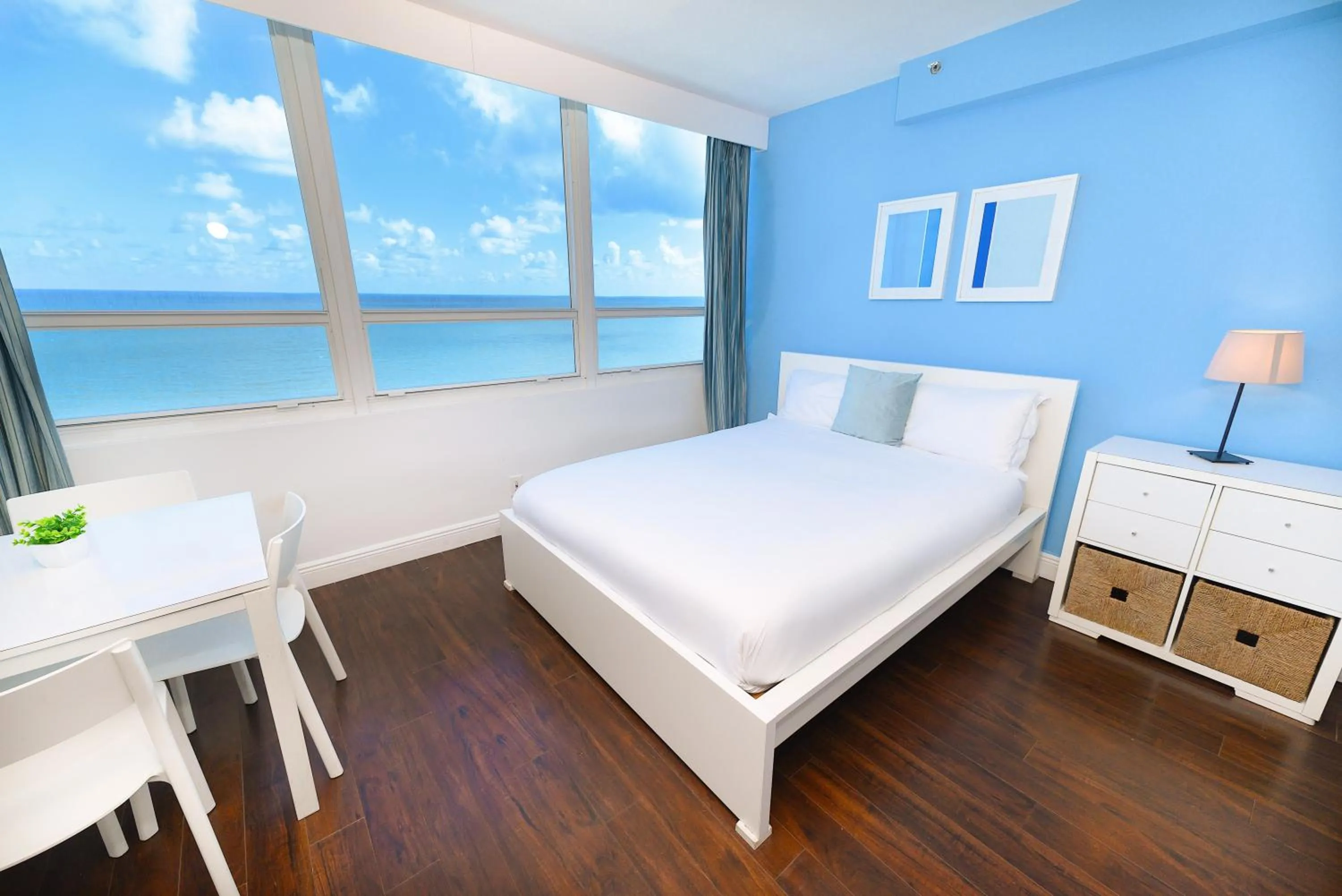 Bed in SeaStays Apartments