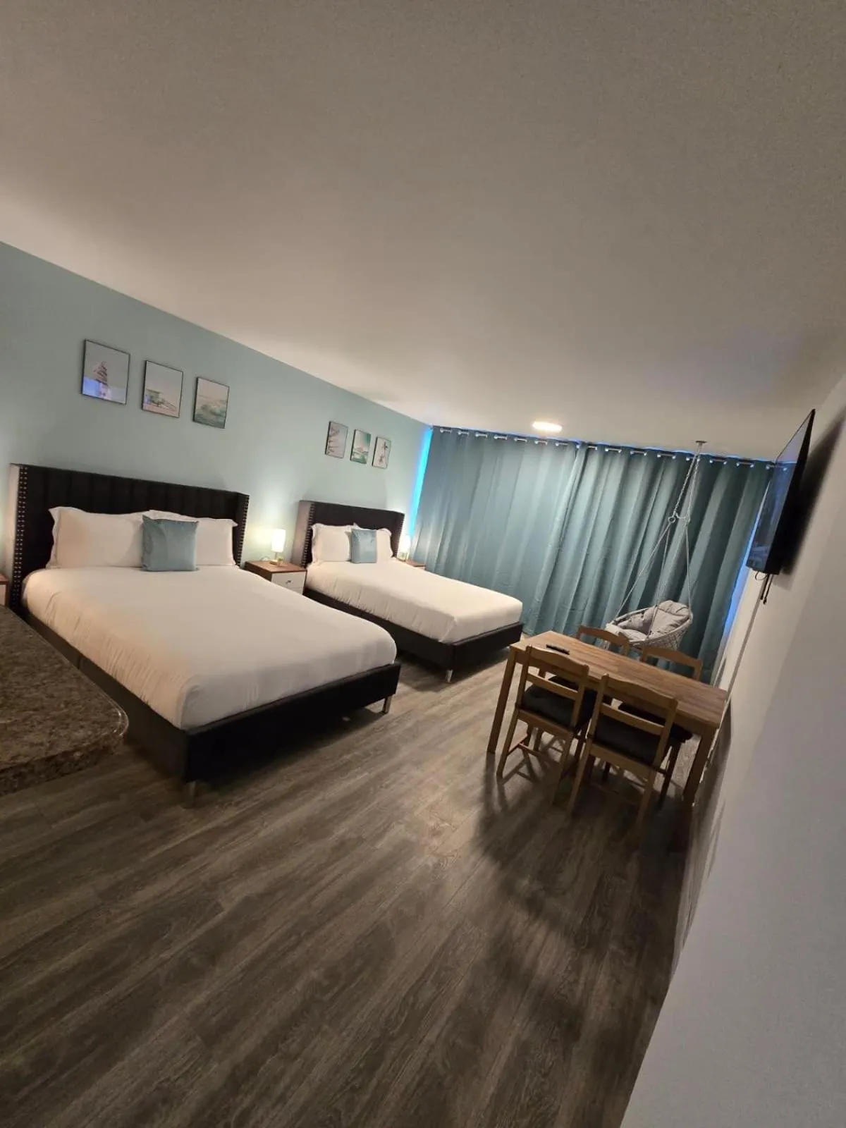 Bed in SeaStays Apartments