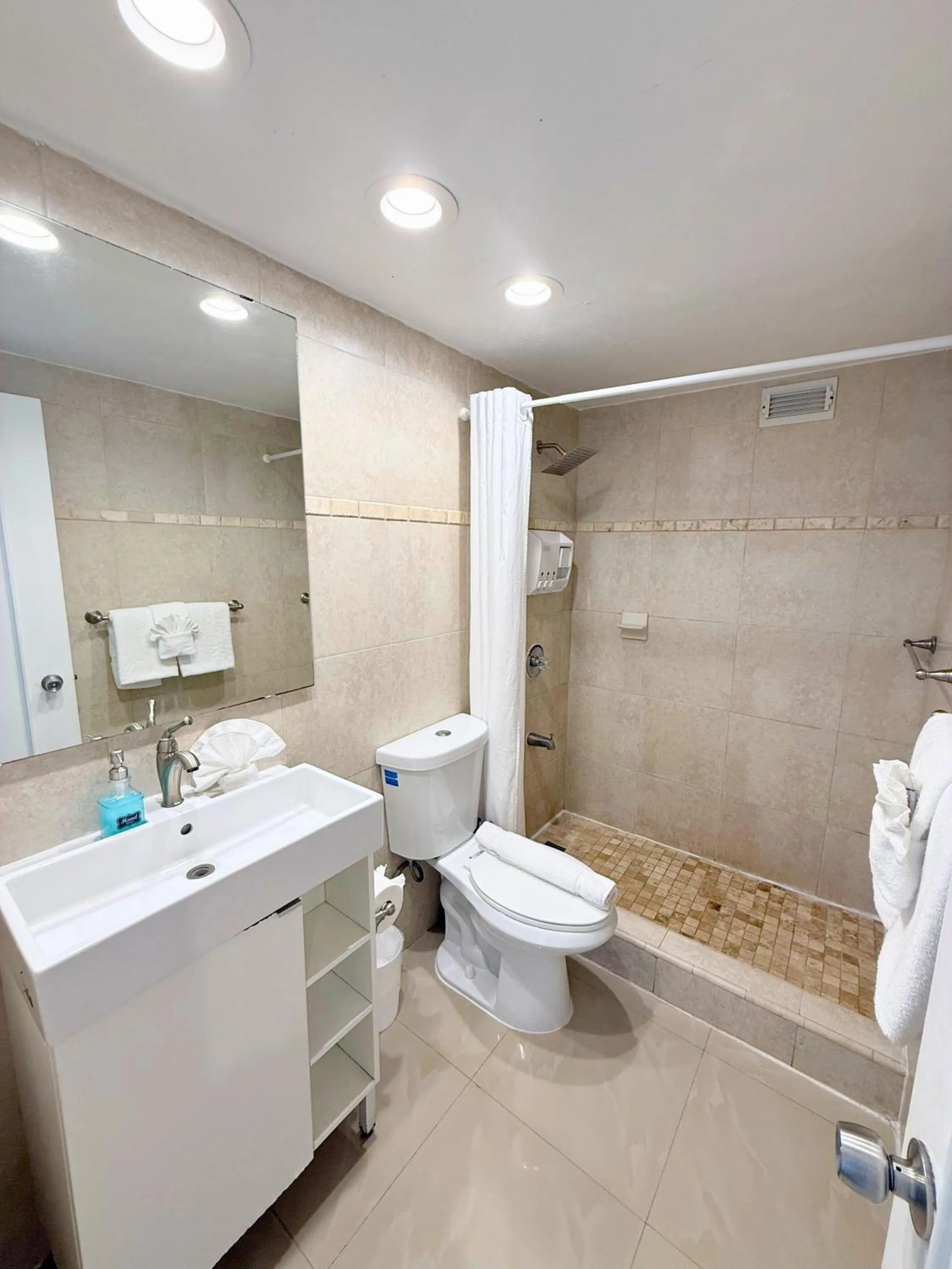 Shower in SeaStays Apartments