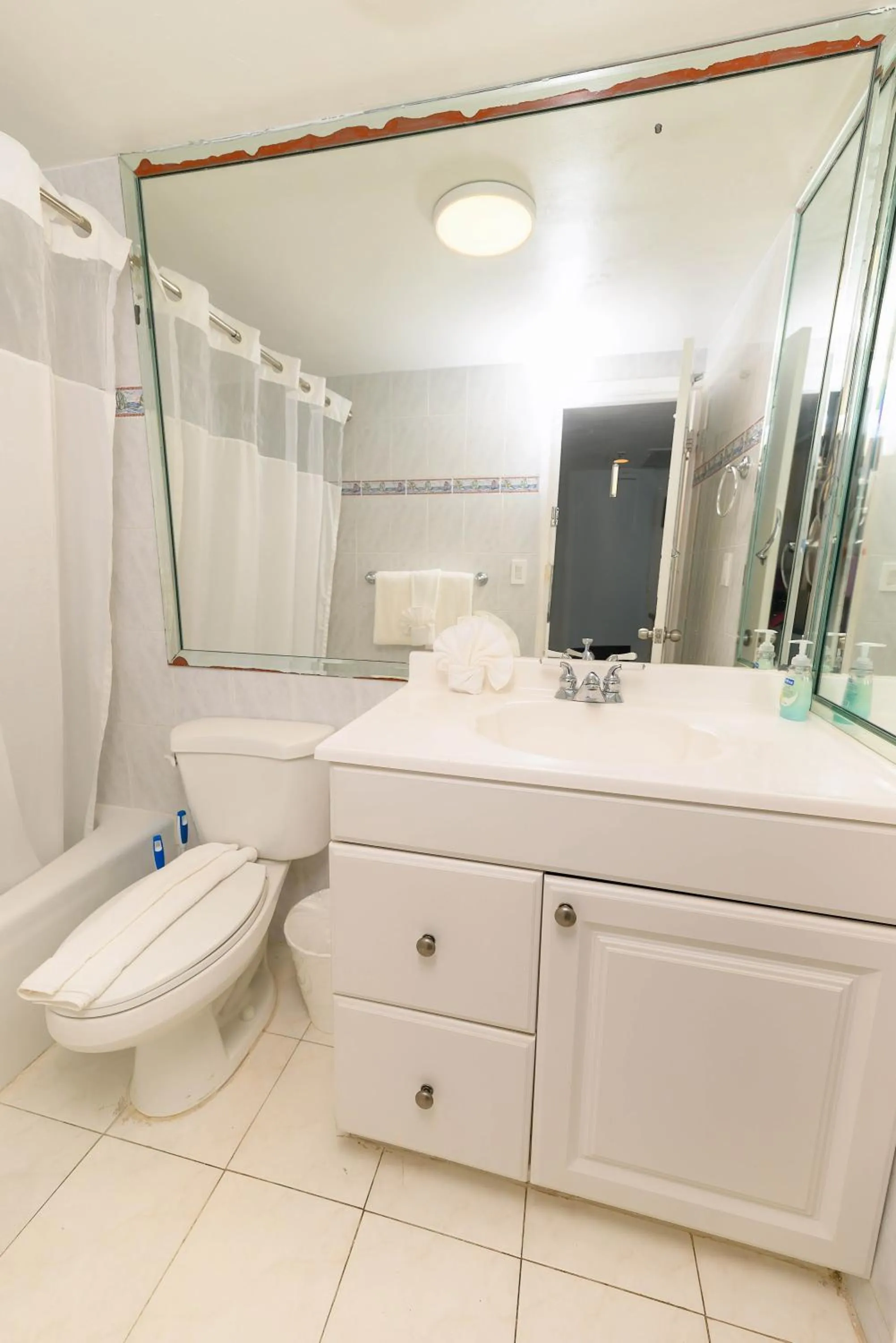 Shower in SeaStays Apartments