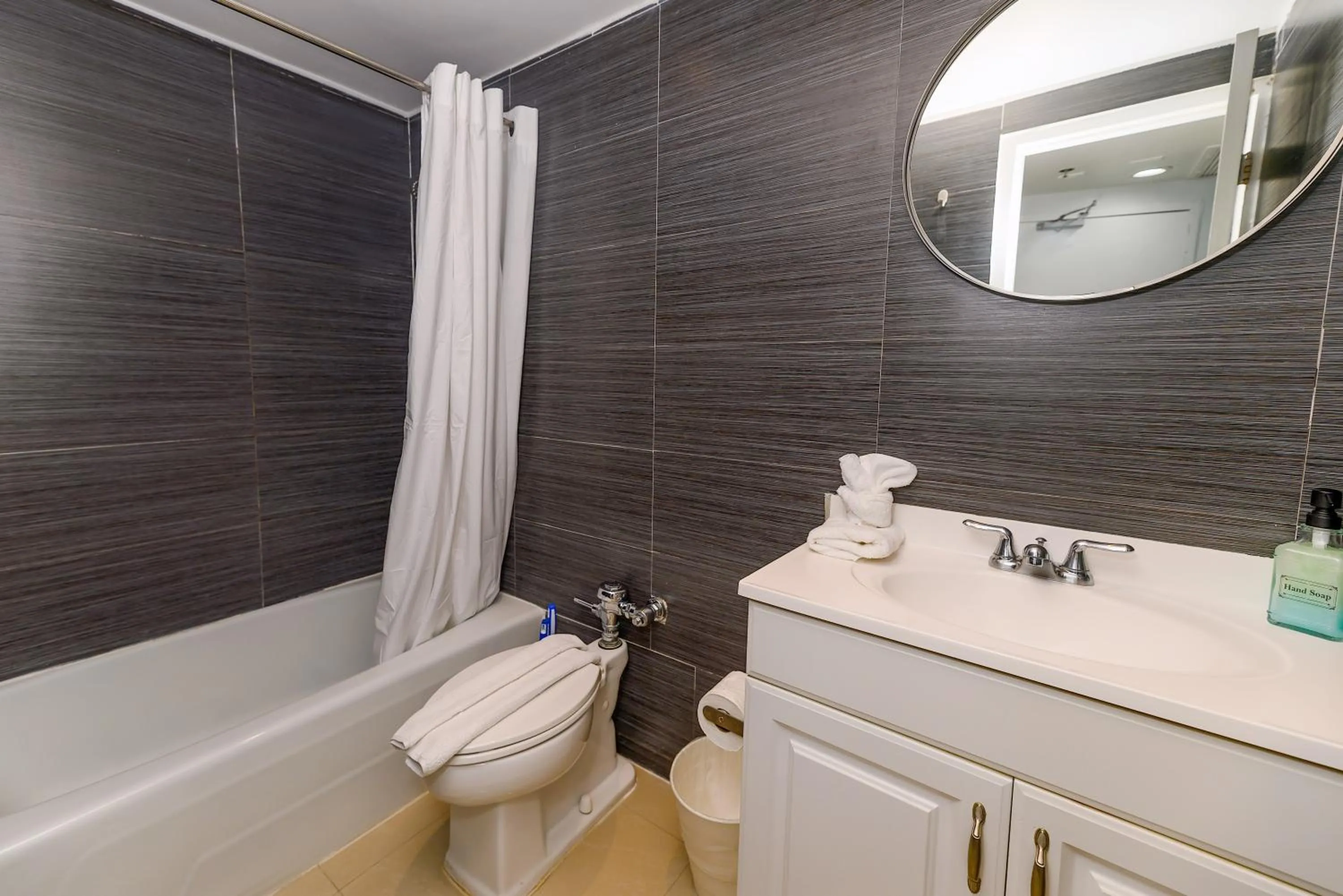 Shower in SeaStays Apartments