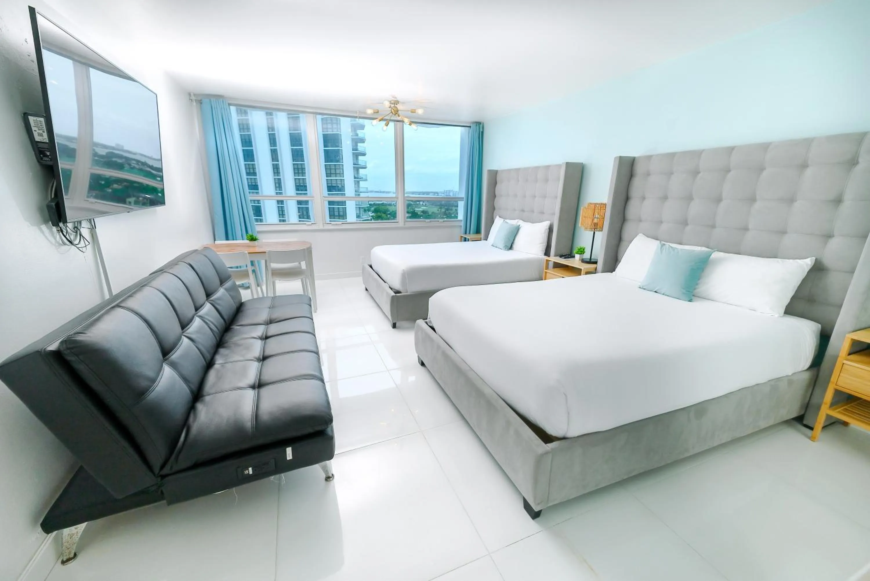 Bed in SeaStays Apartments