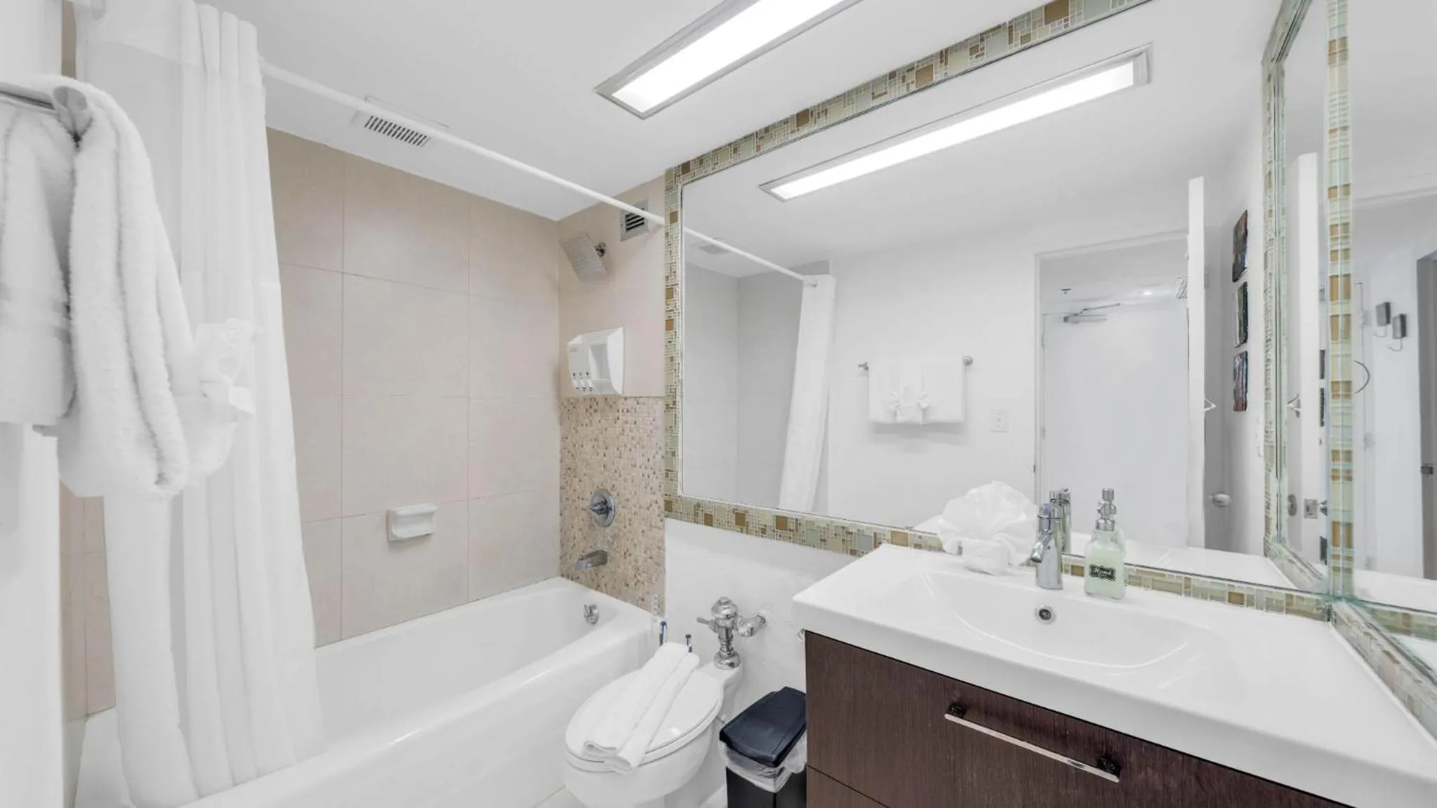 Shower in SeaStays Apartments