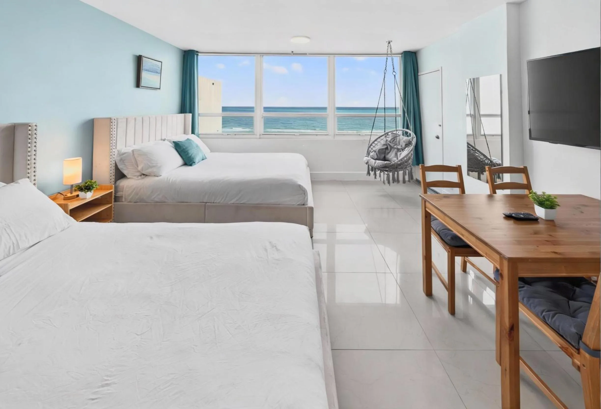 Bed in SeaStays Apartments